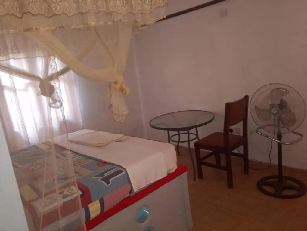 Bed in Richy Hotels and Safaris