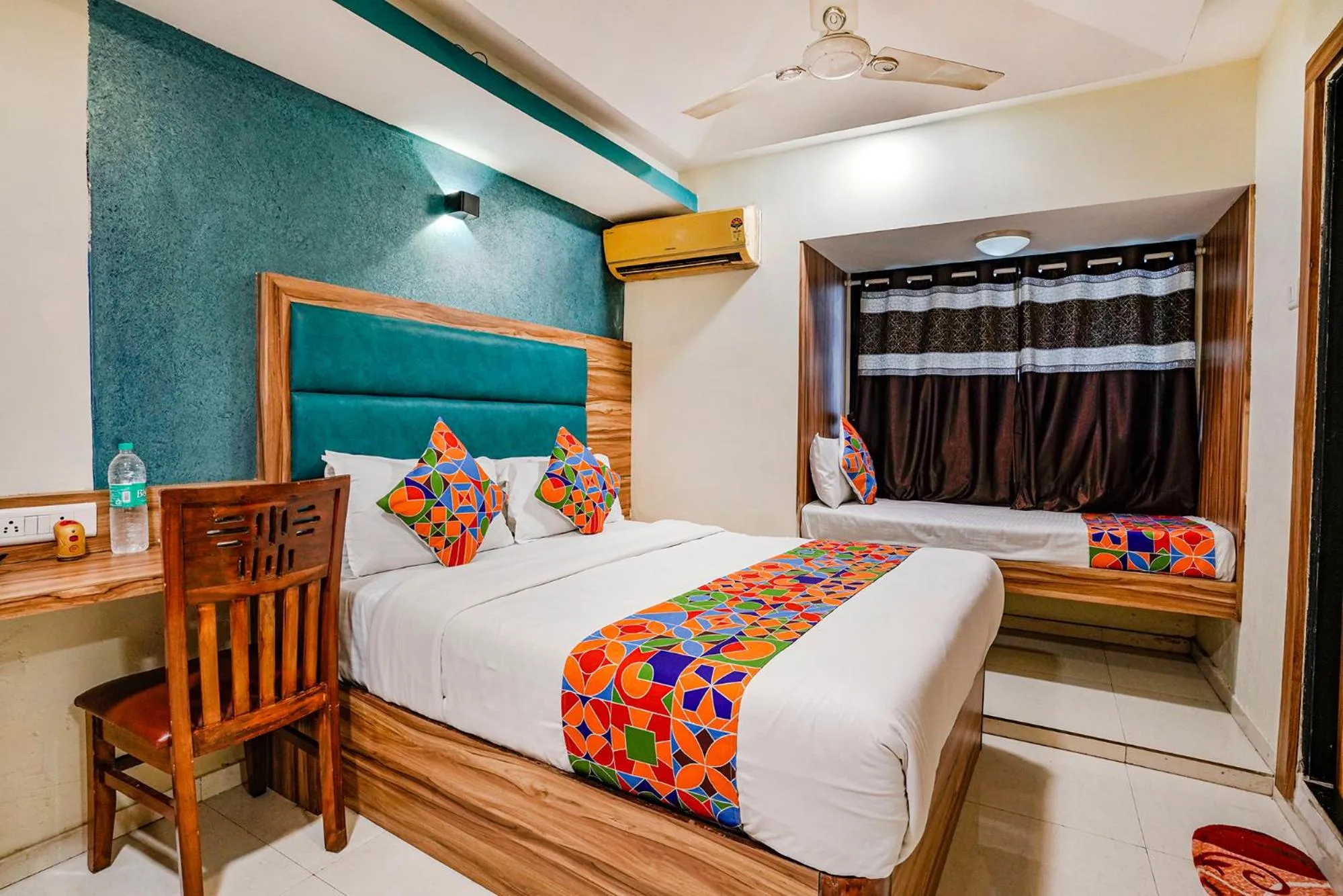 Bed in FabHotel Amber Corp Inn