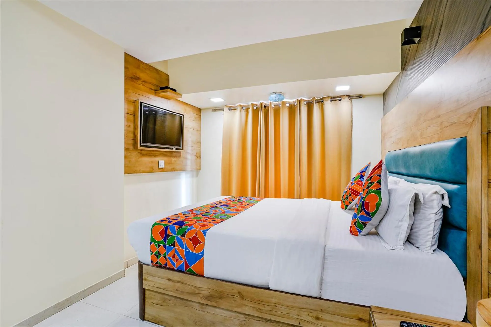 Bed in FabHotel Amber Corp Inn