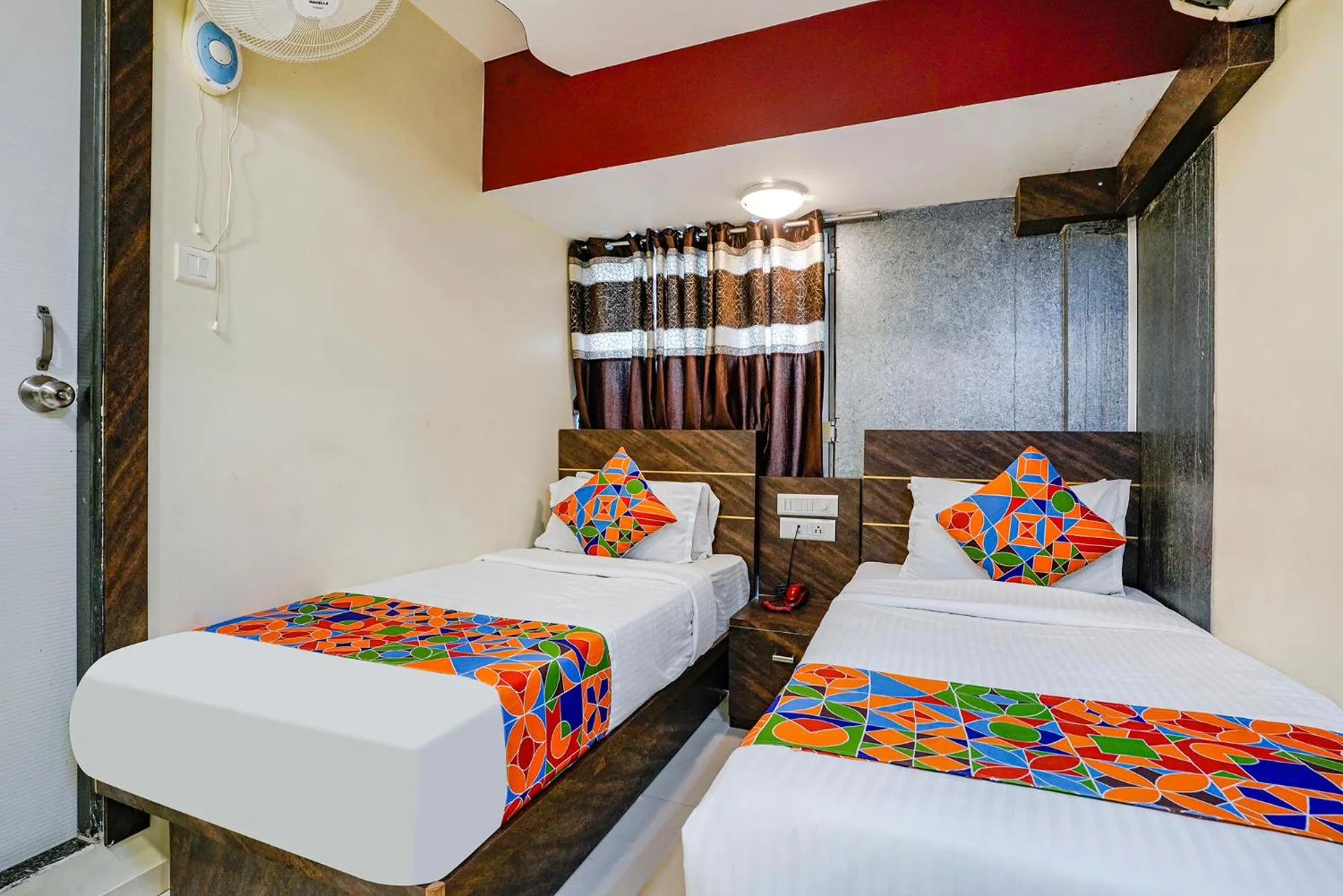 Bed in FabHotel Amber Corp Inn