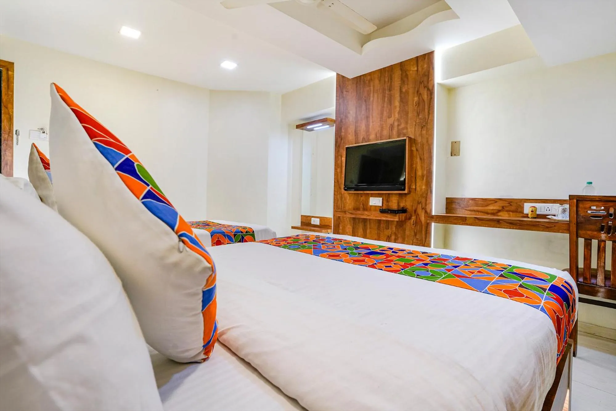 Bed in FabHotel Amber Corp Inn