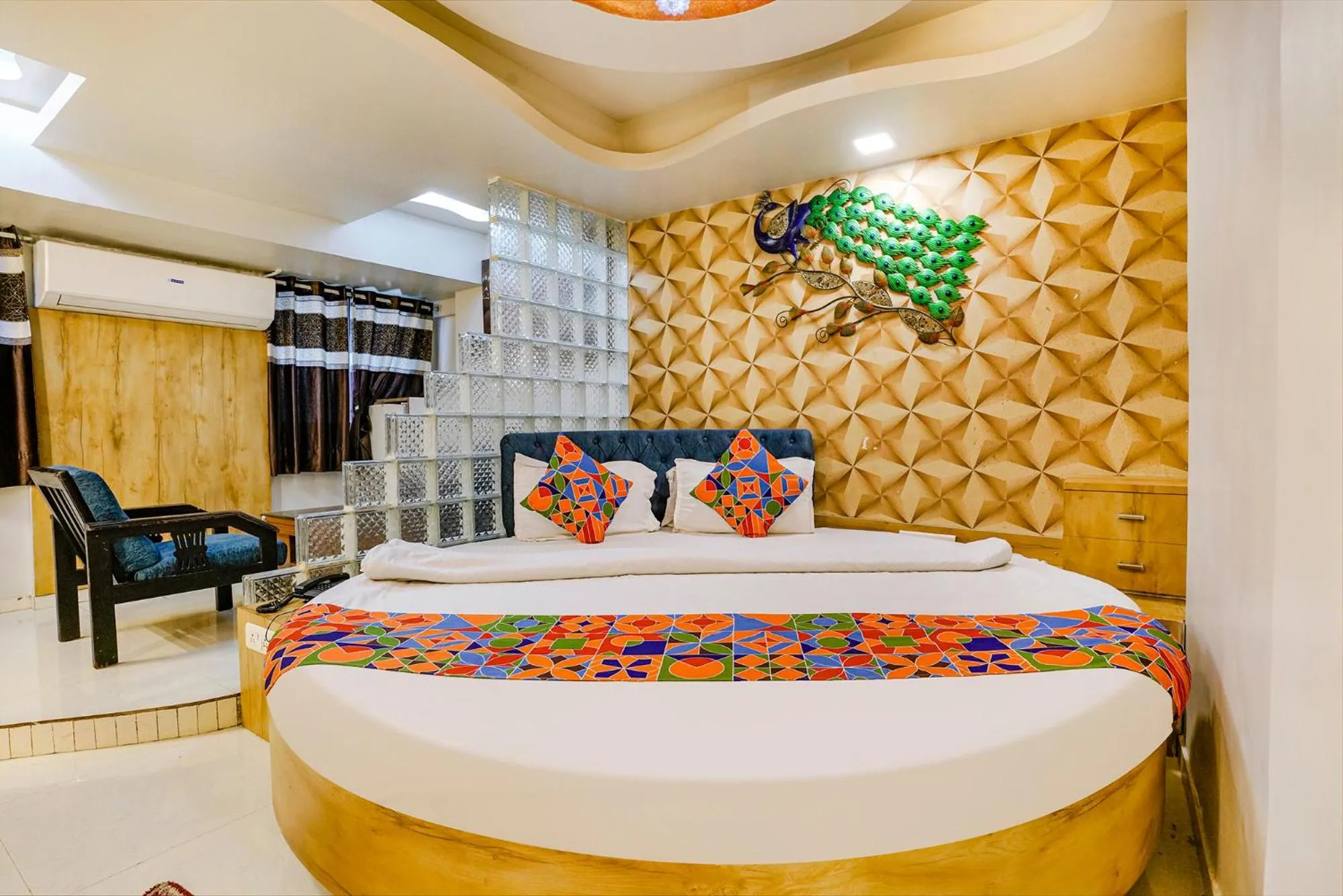 Bed in FabHotel Amber Corp Inn