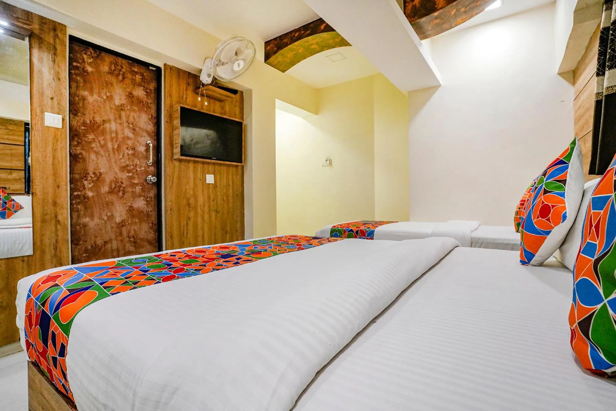 Bed in FabHotel Amber Corp Inn