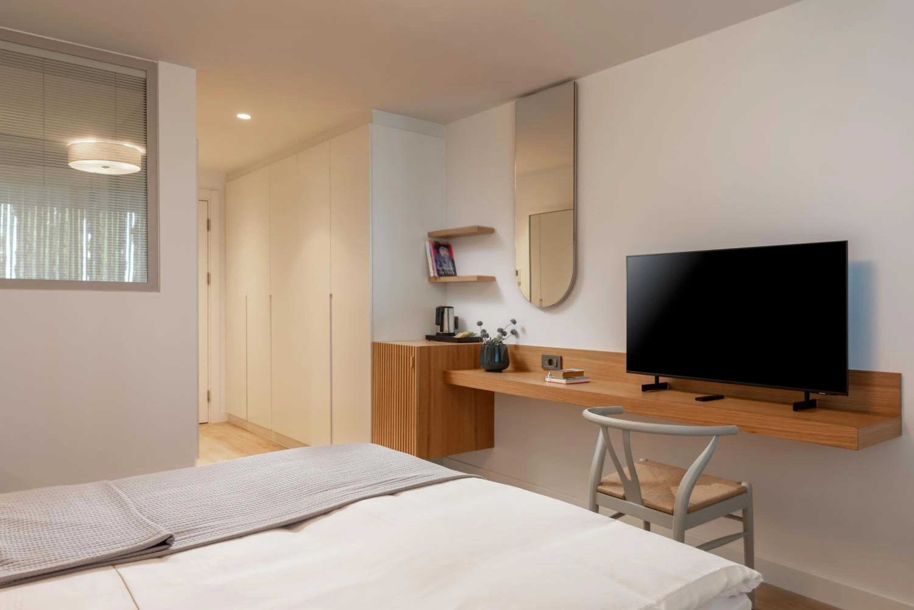 TV and multimedia, Bed in Hiddenbay Teos Hotel