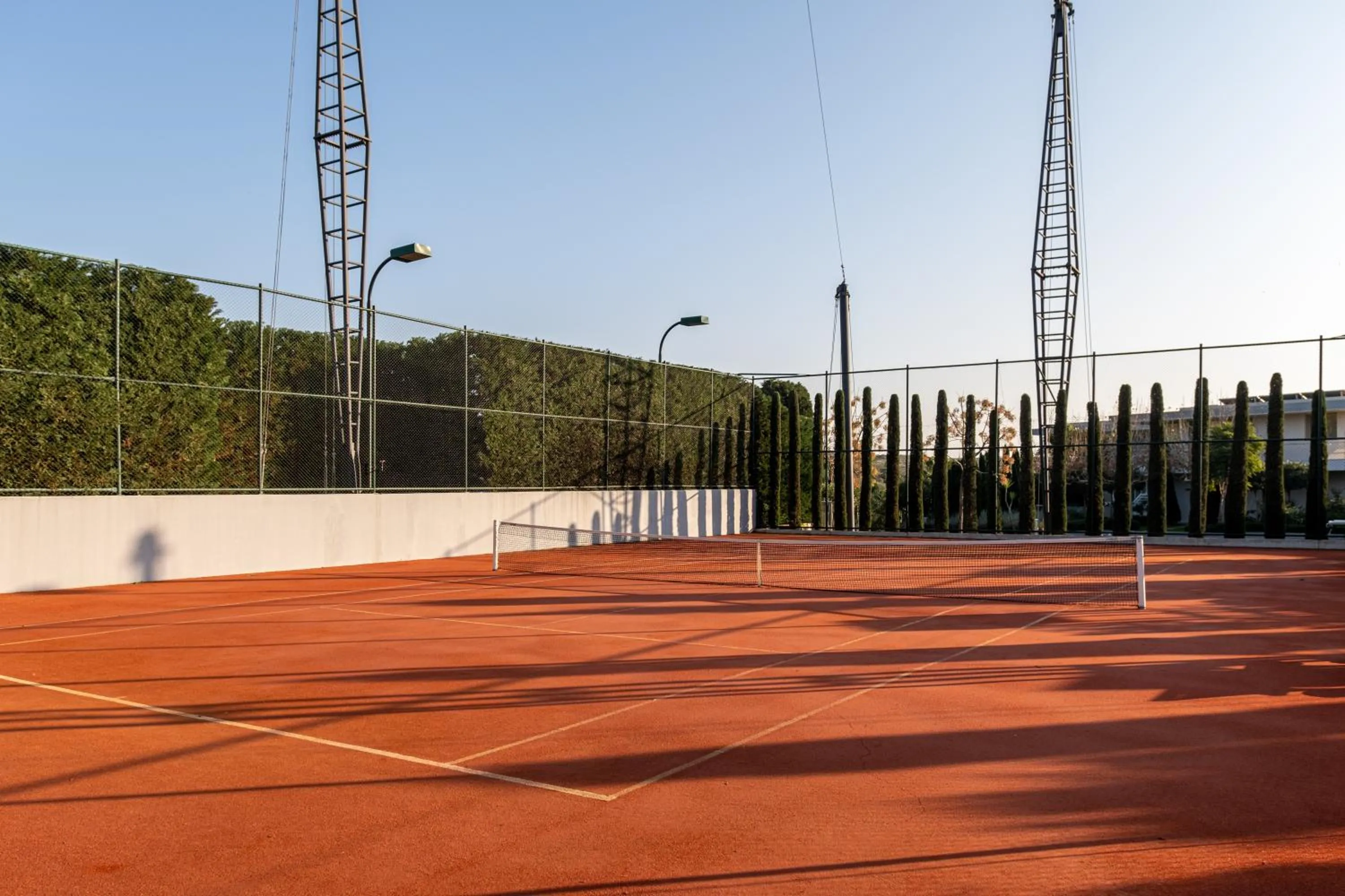 Tennis court in Hiddenbay Teos Hotel