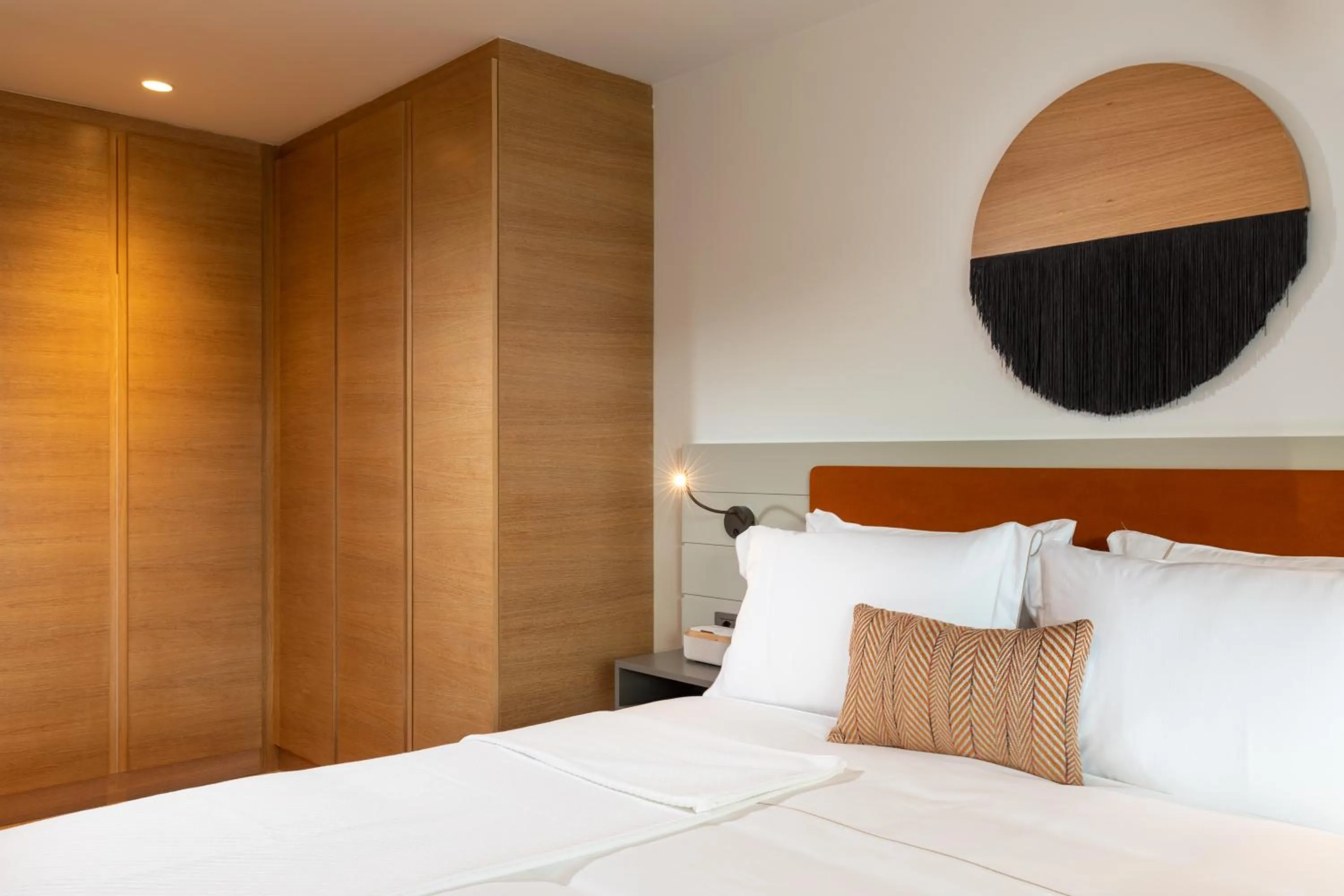 Bed in Hiddenbay Teos Hotel