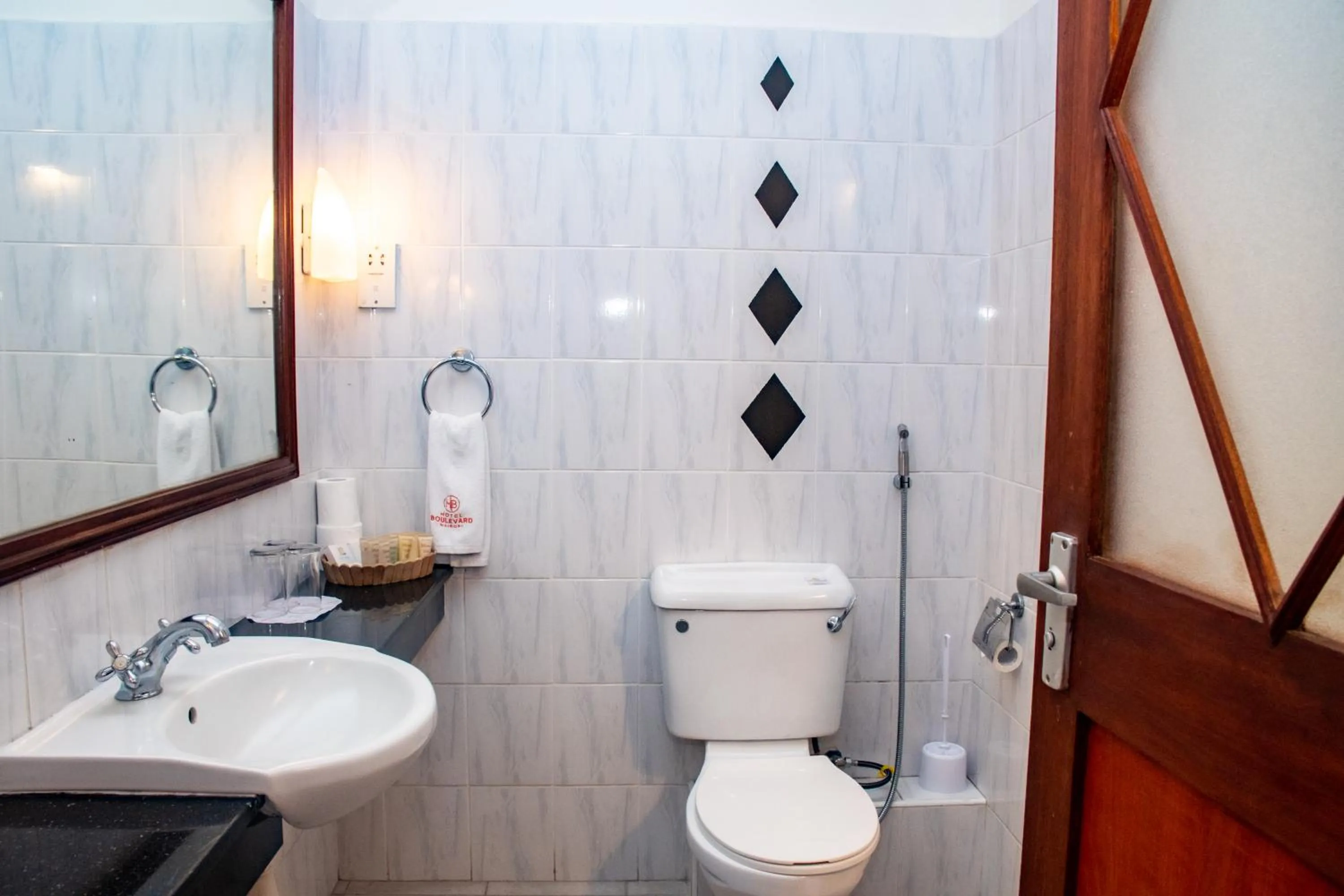 Toilet in Hotel Boulevard Nairobi, City Centre CBD