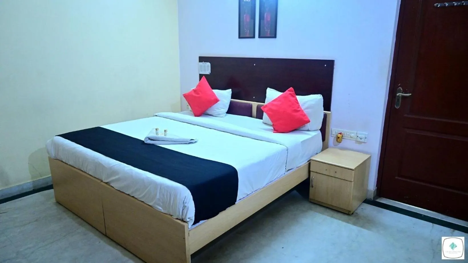 Bed in The Roy Grand Inns