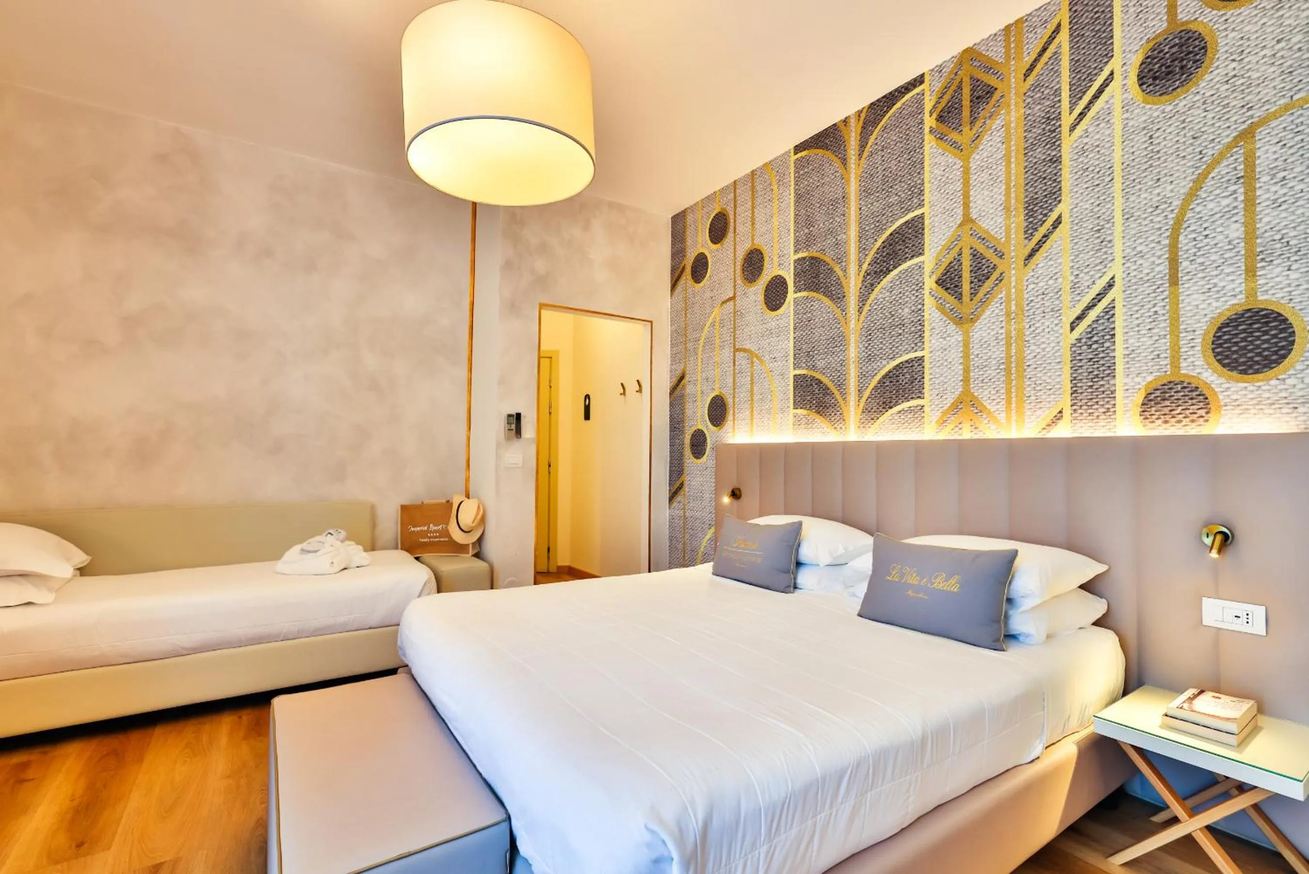 Bed in UNAHOTELS Imperial Sport Hotel