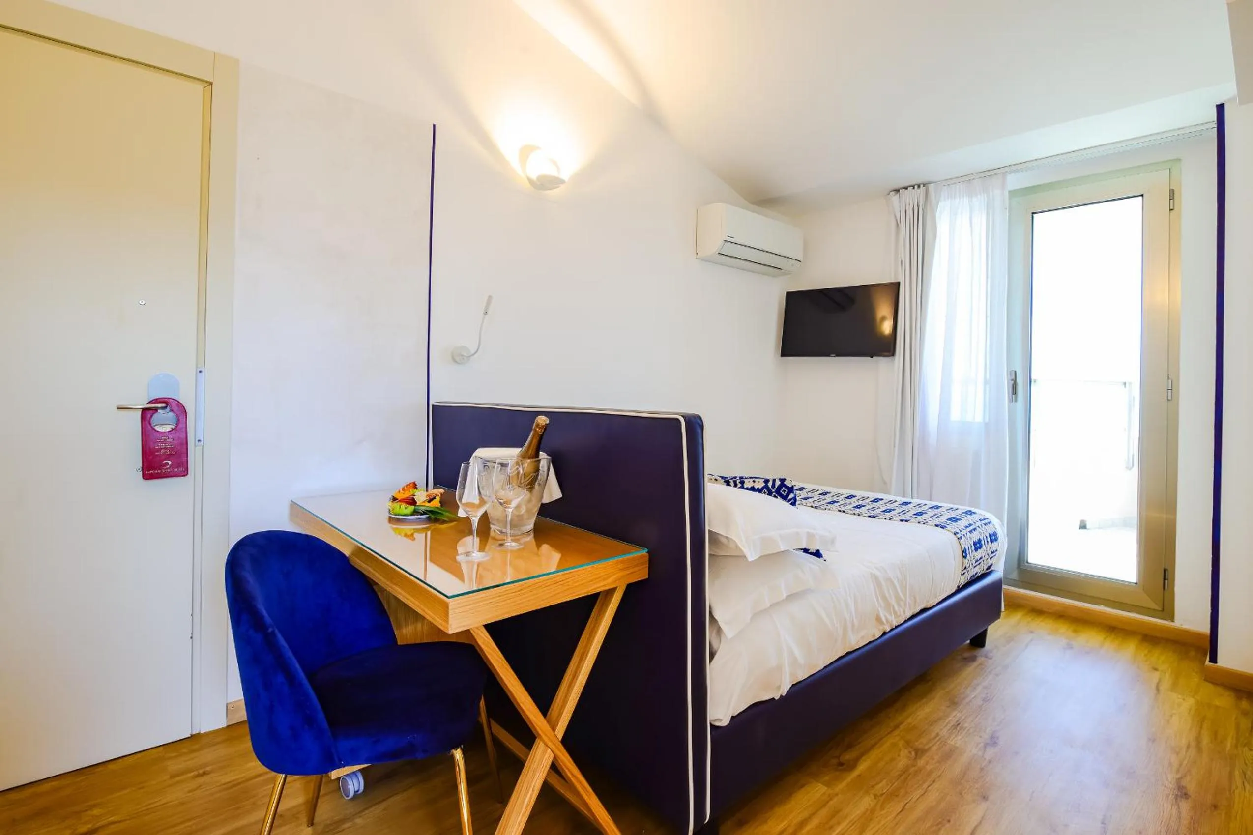 Bed in UNAHOTELS Imperial Sport Hotel