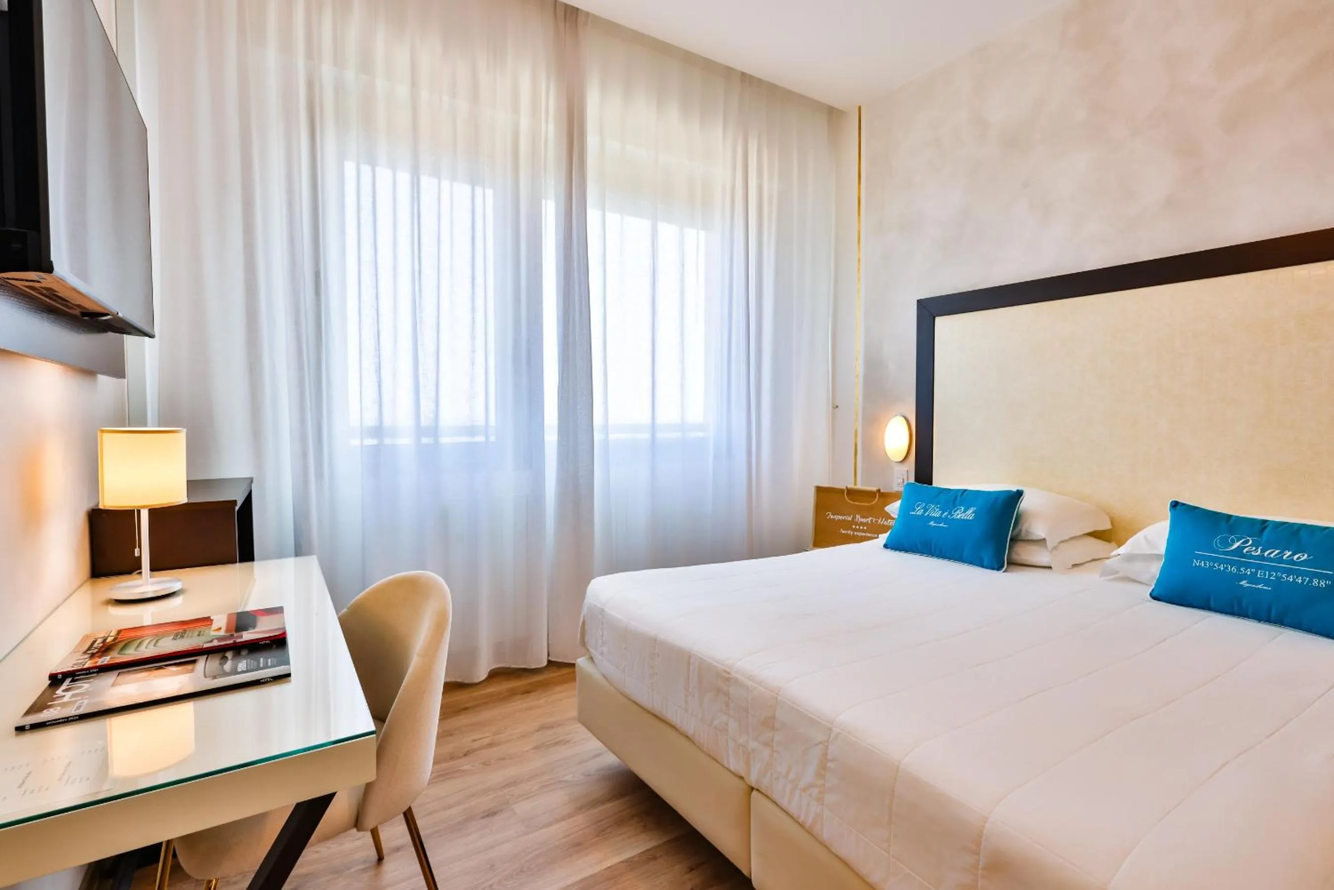 Bed in UNAHOTELS Imperial Sport Hotel