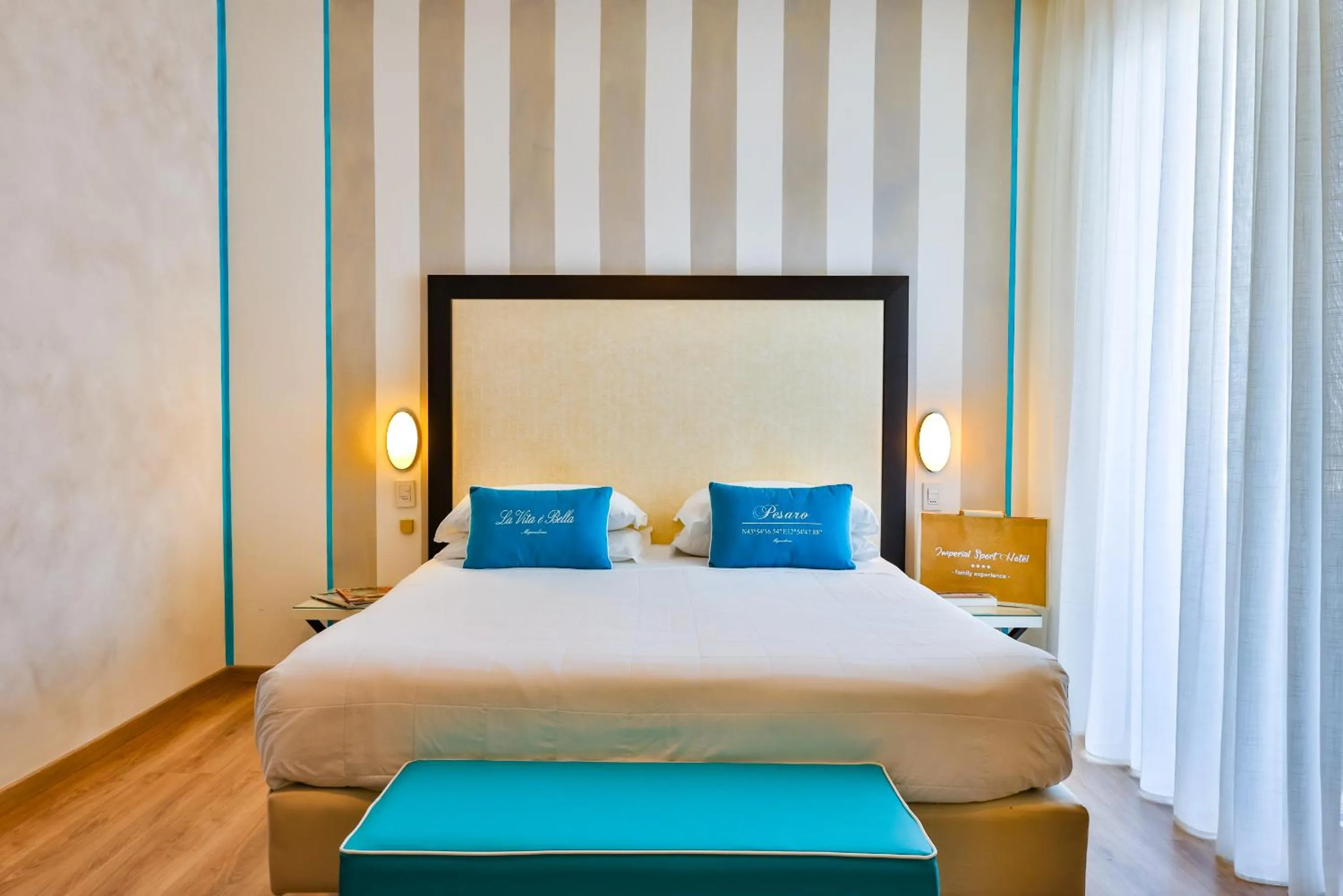 Bed in UNAHOTELS Imperial Sport Hotel