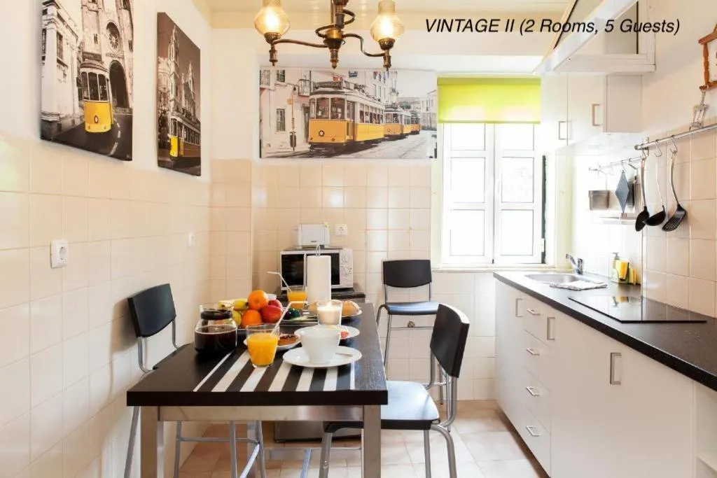 Kitchen or kitchenette in Alfama Vintage 1 Ten guests - Alfama Vintage 2 Five guests - Alfama Vintage 3 Three Guests