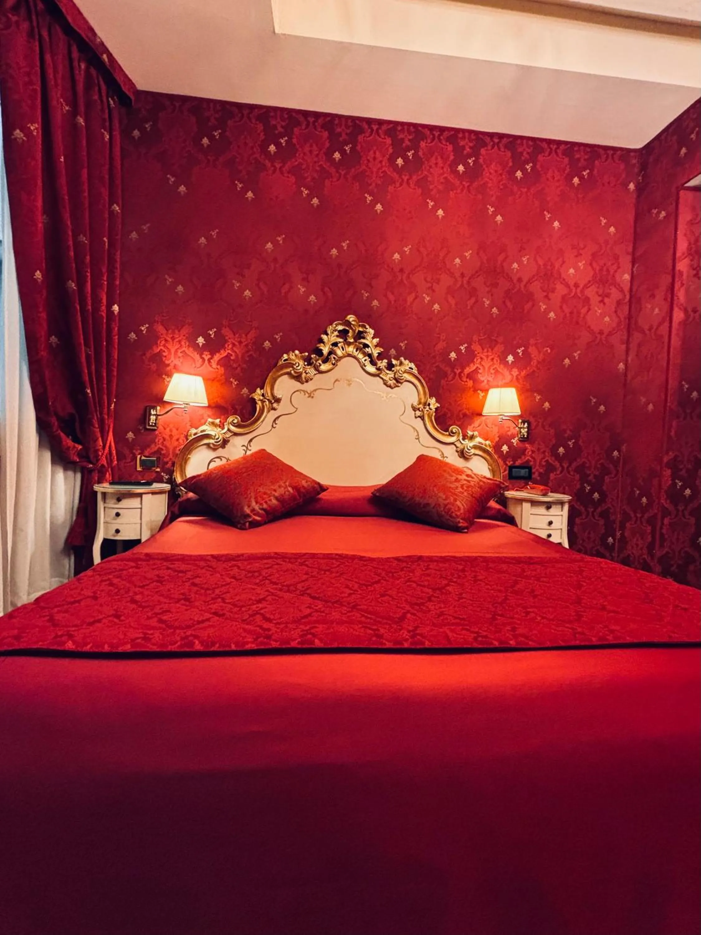 Bed in Hotel al Graspo de Ua