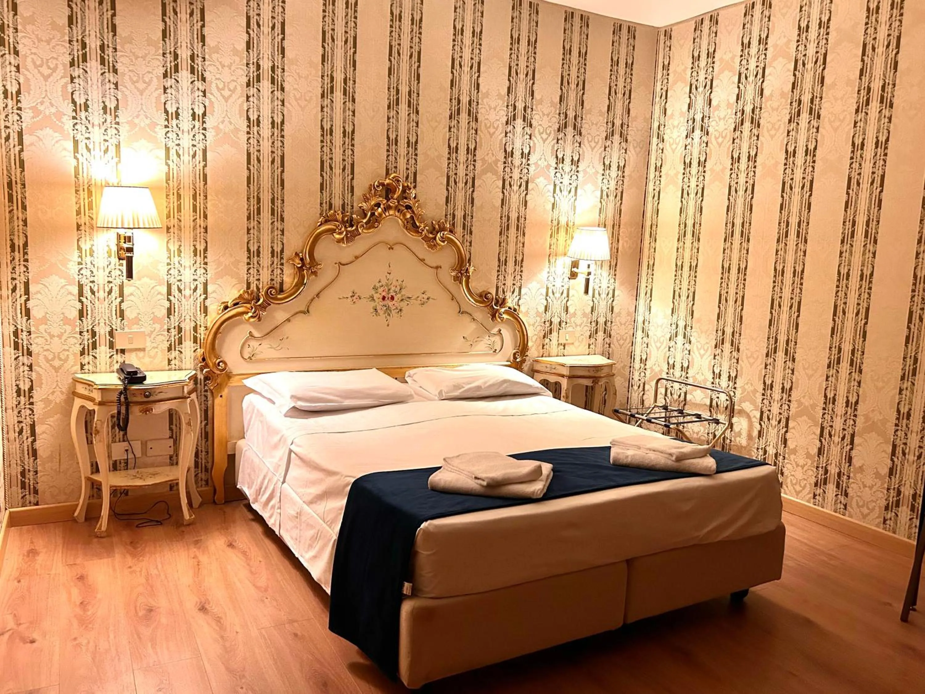 Bed in Hotel al Graspo de Ua
