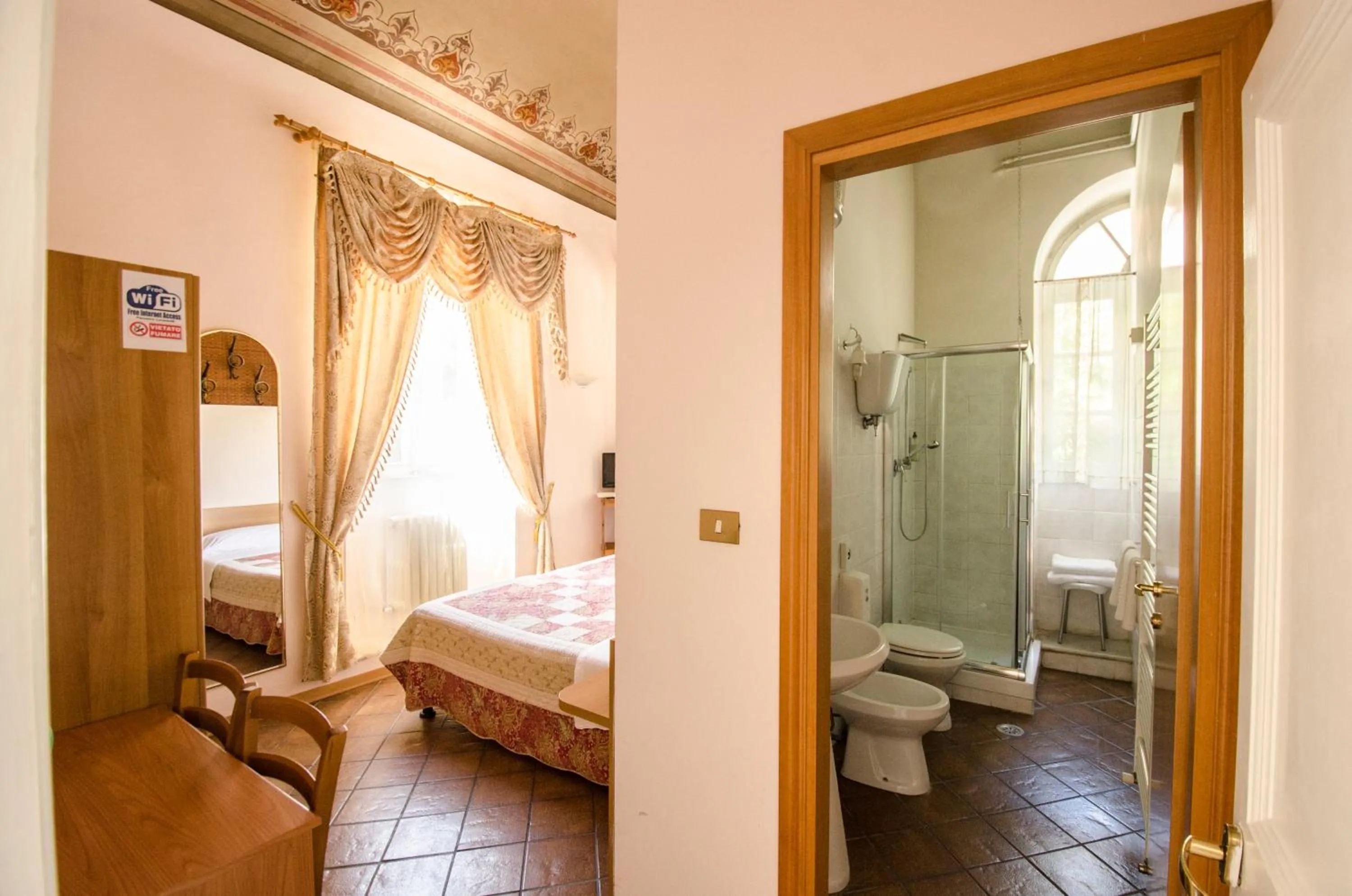 Shower, Bed in Hotel Iris