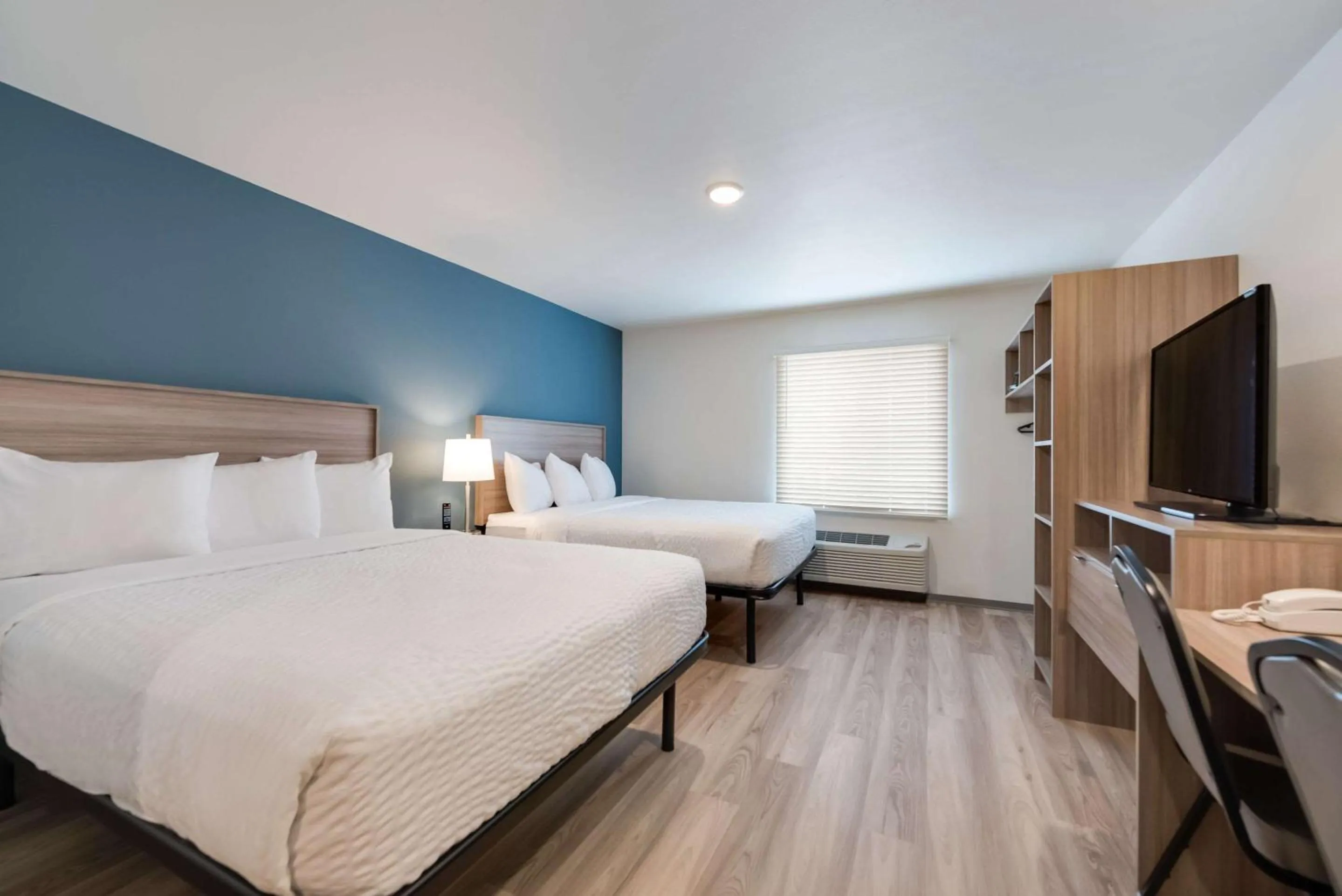Bedroom, Bed in WoodSpring Suites Meridian