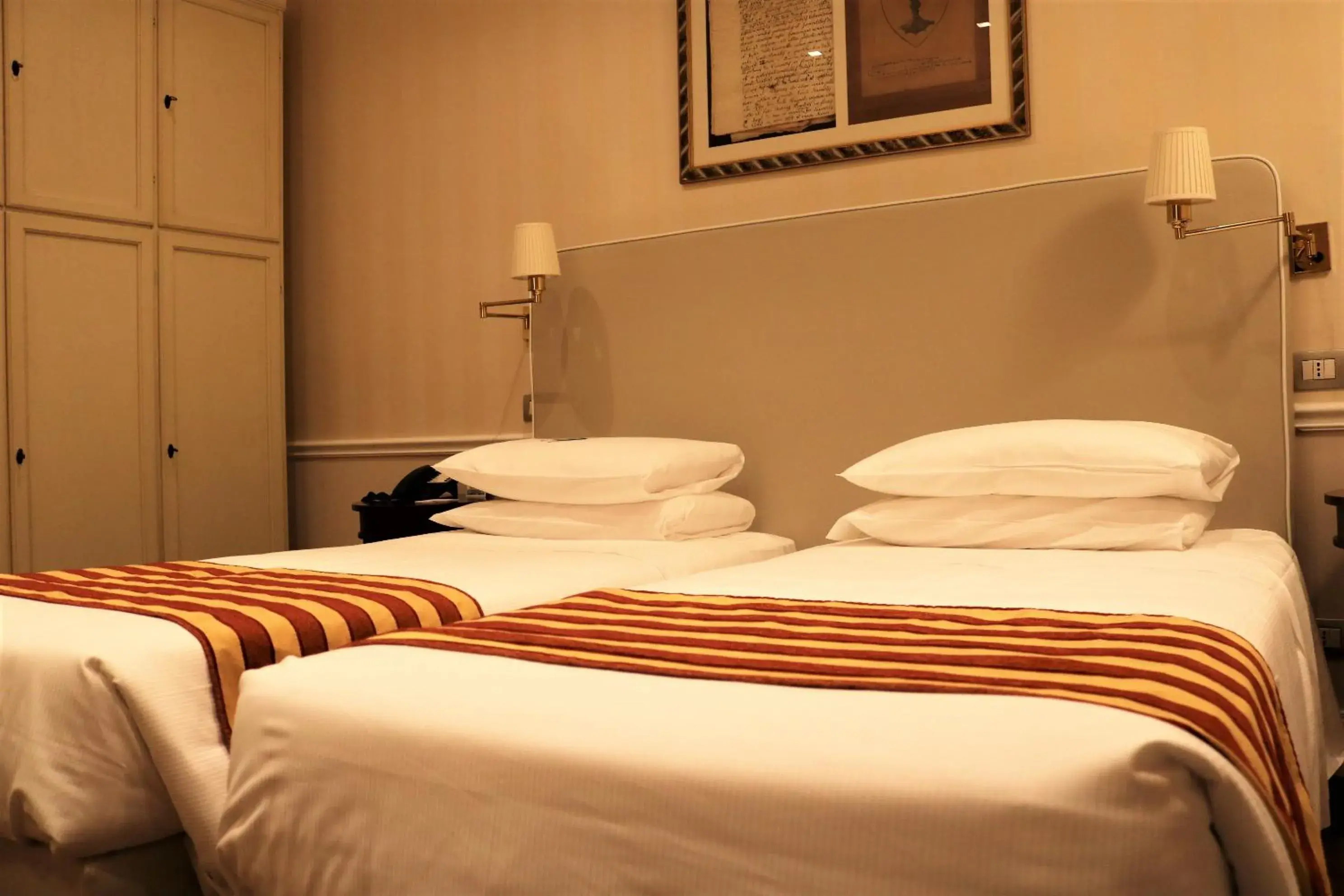 Bed in Hotel Firenze e Continentale Bed in Hotel Firenze e Continentale