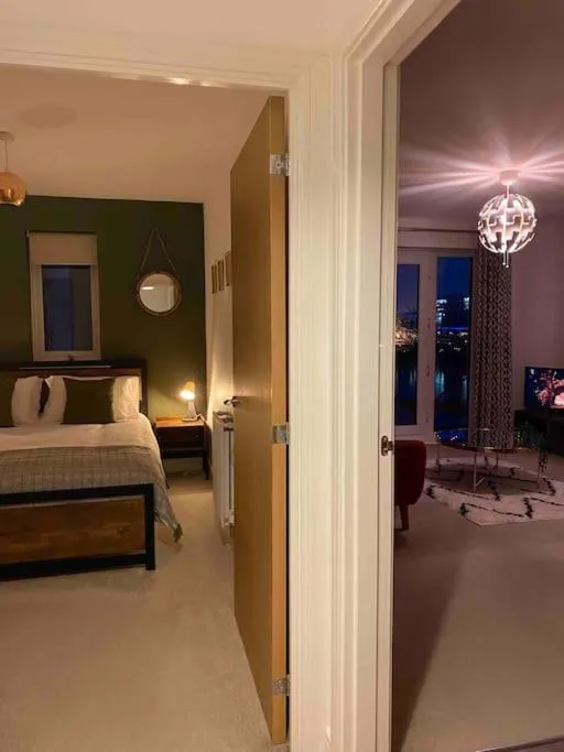 Bed in Luxury 2 Bedroom waterfront apartment with balcony