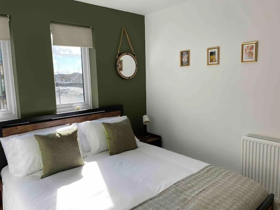 Bed in Luxury 2 Bedroom waterfront apartment with balcony