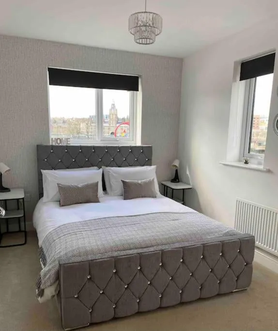 Bed in Luxury 2 Bedroom waterfront apartment with balcony
