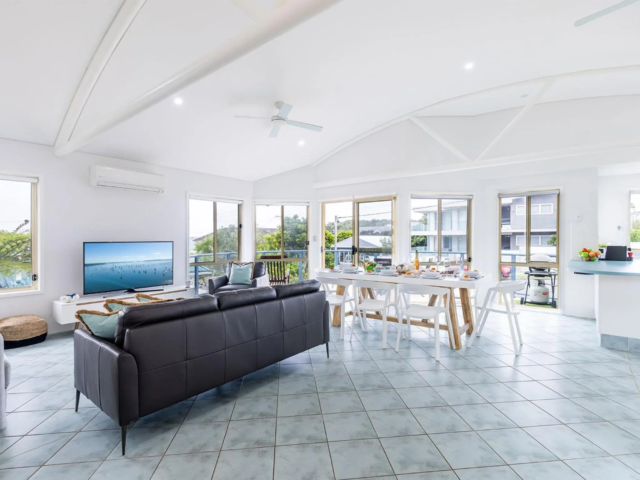 Living room in Baia Villa air con WiFi and views of Fingal Beach