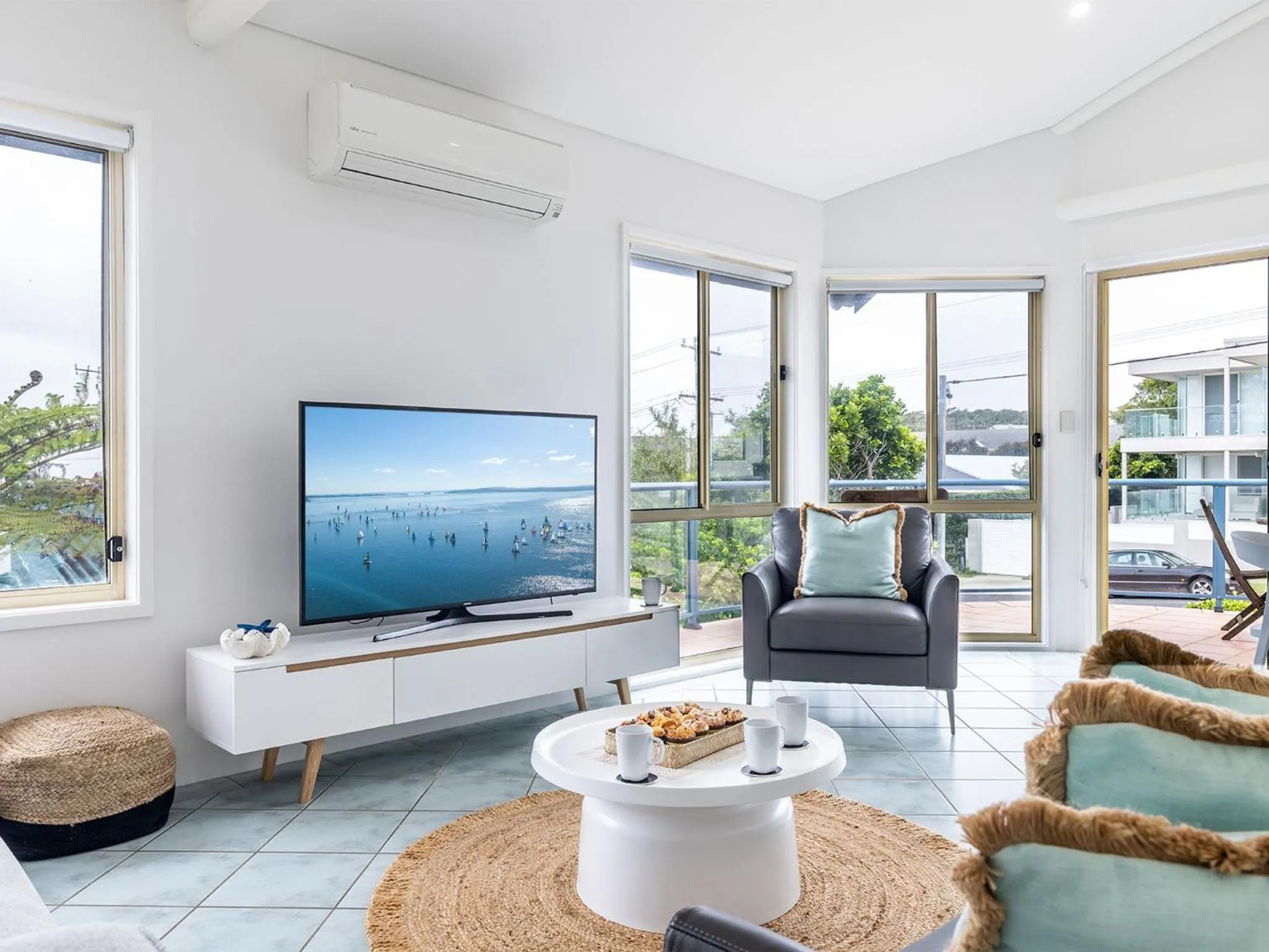 Living room in Baia Villa air con WiFi and views of Fingal Beach