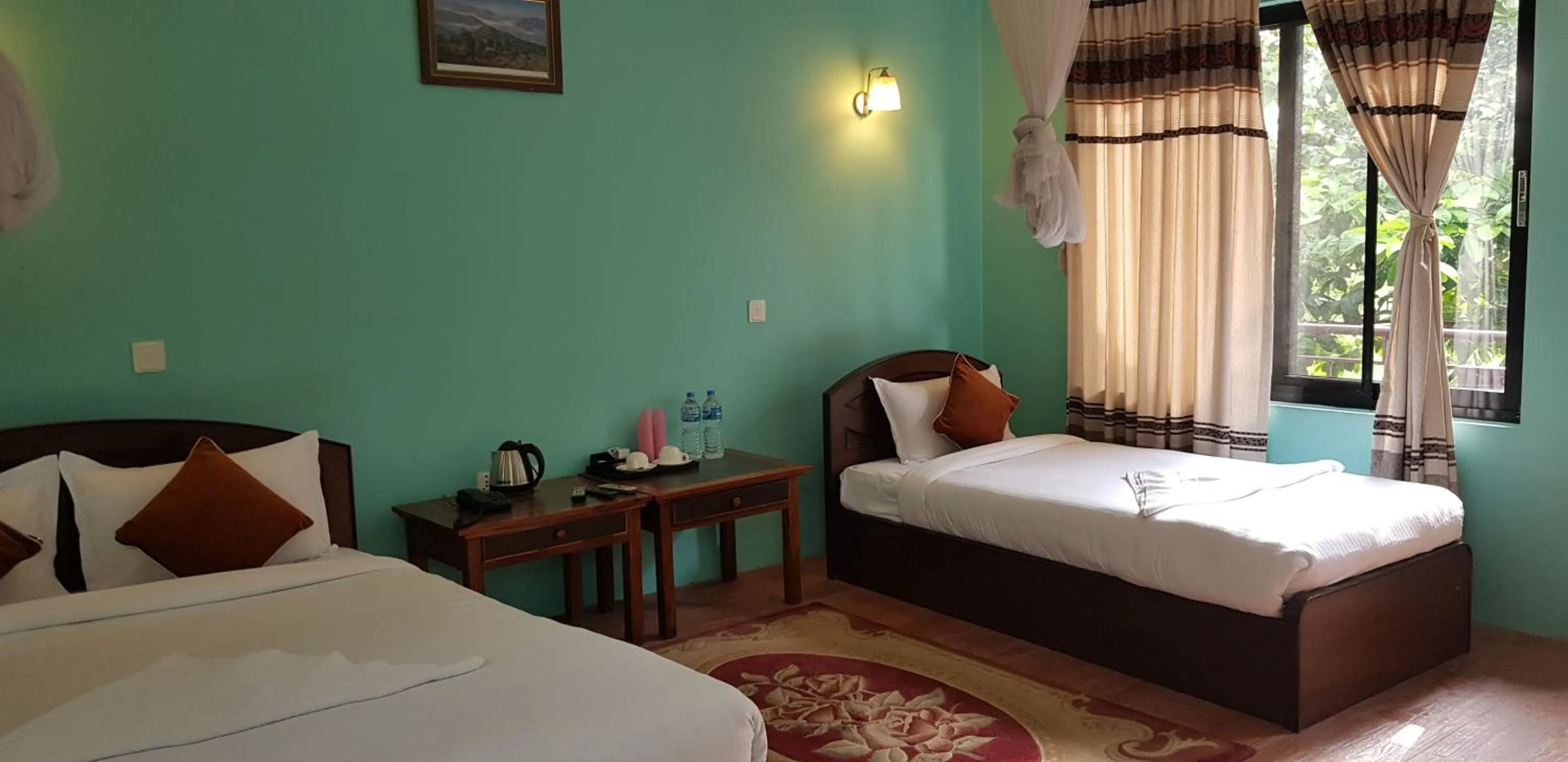 Bed in Lumbini Buddha Garden Resort