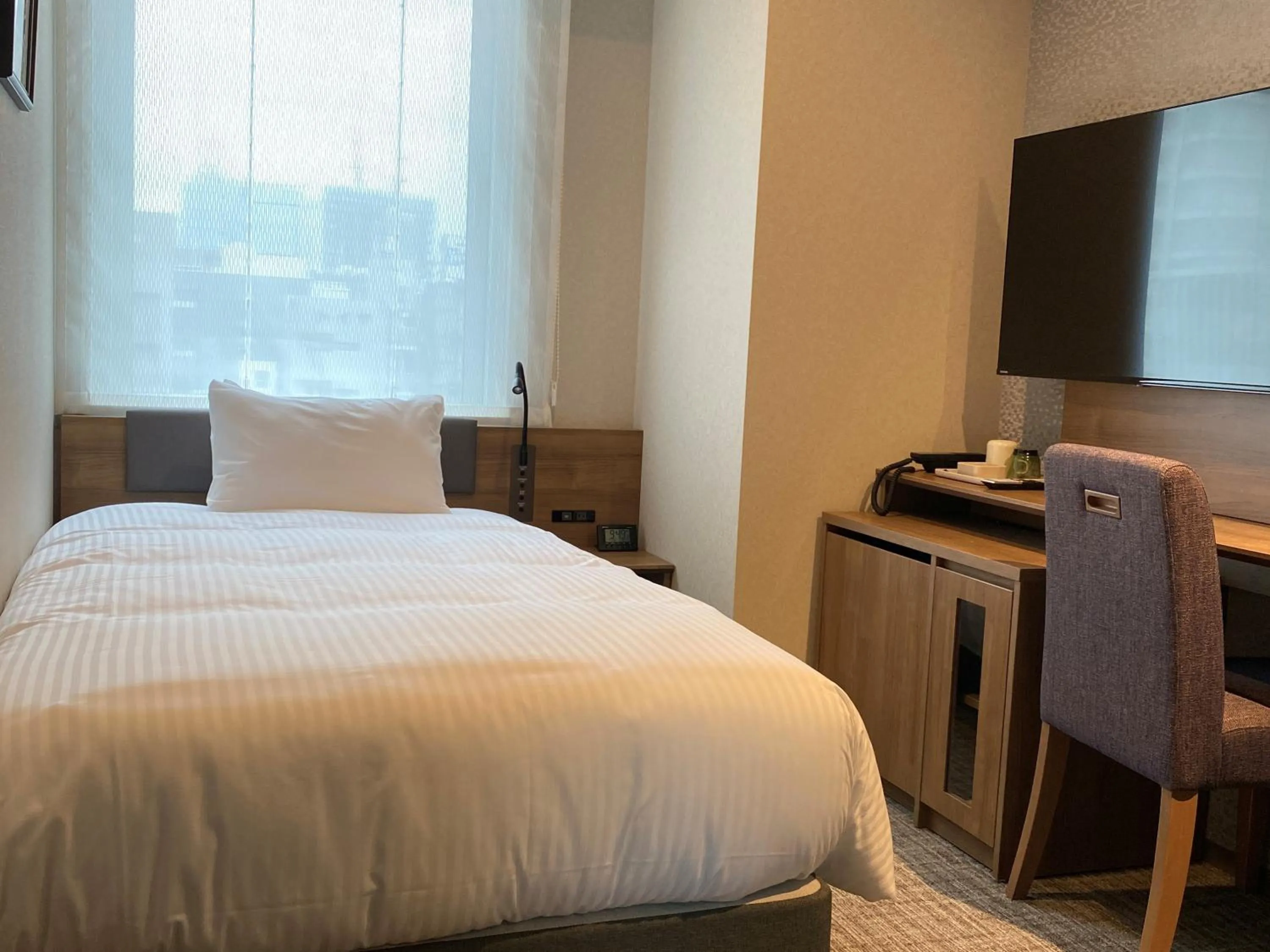 Bed in Hotel Rilassare Tokyo