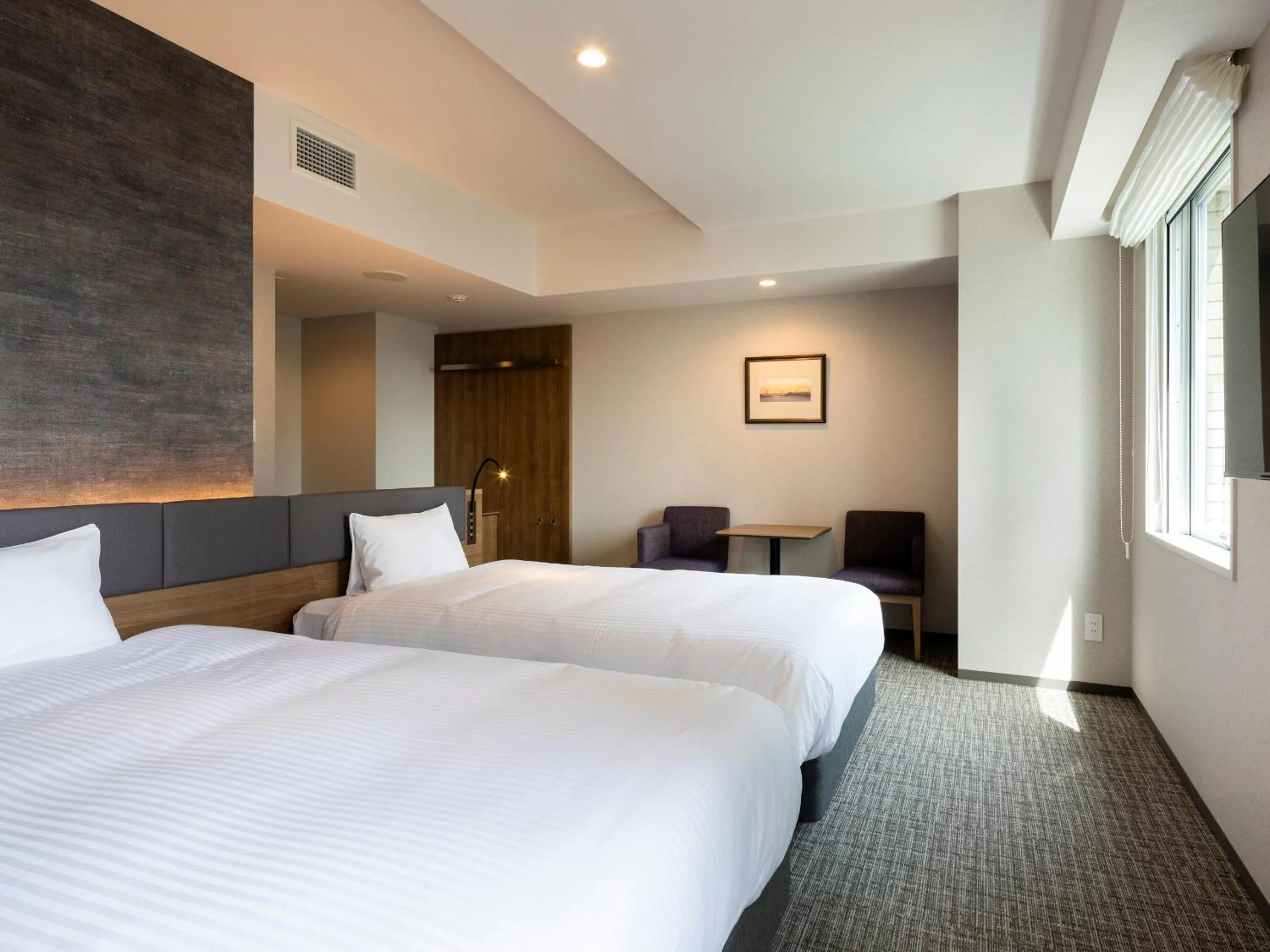 Bed in Hotel Rilassare Tokyo