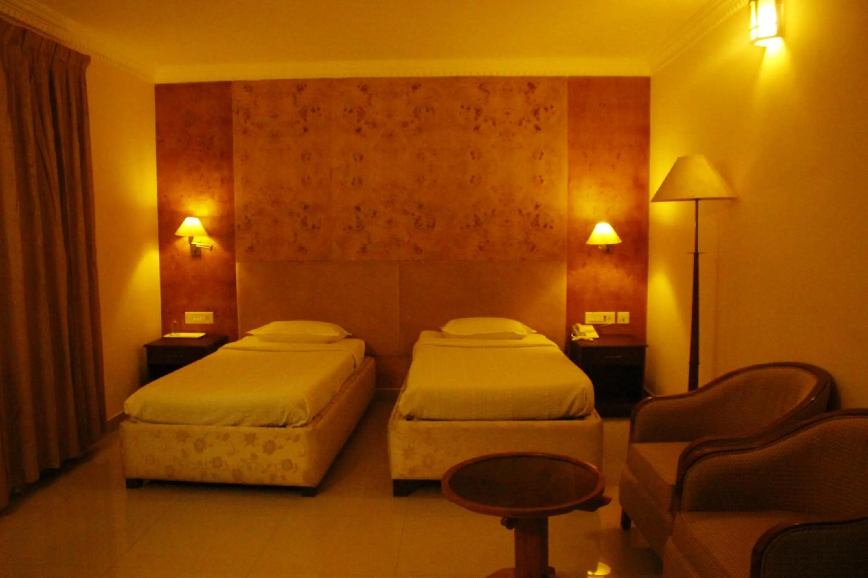 Bedroom in hotel bessota international
