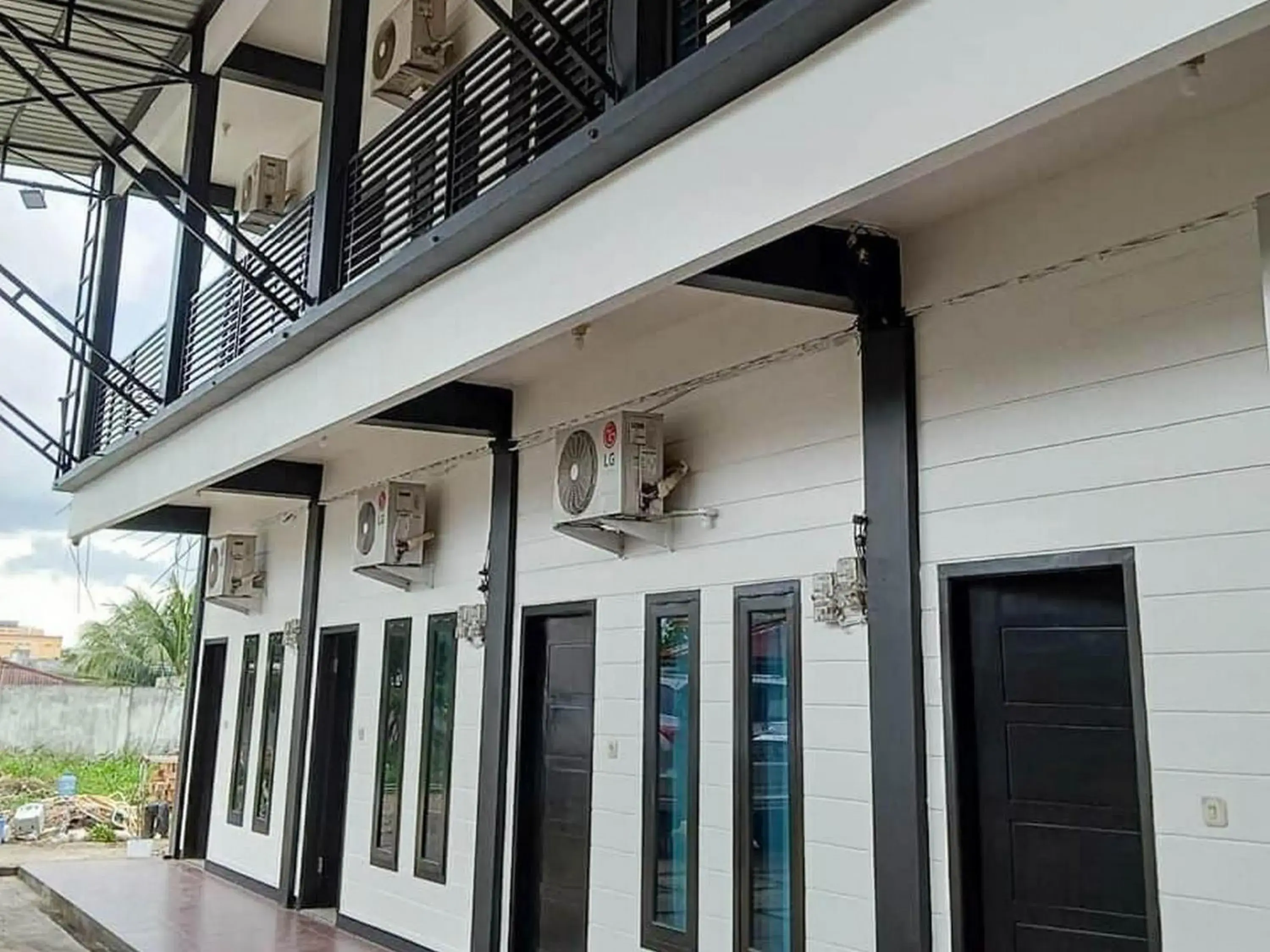 Facade/entrance in Marthine Residence Syariah RedPartner Facade/entrance in Marthine Residence Syariah RedPartner