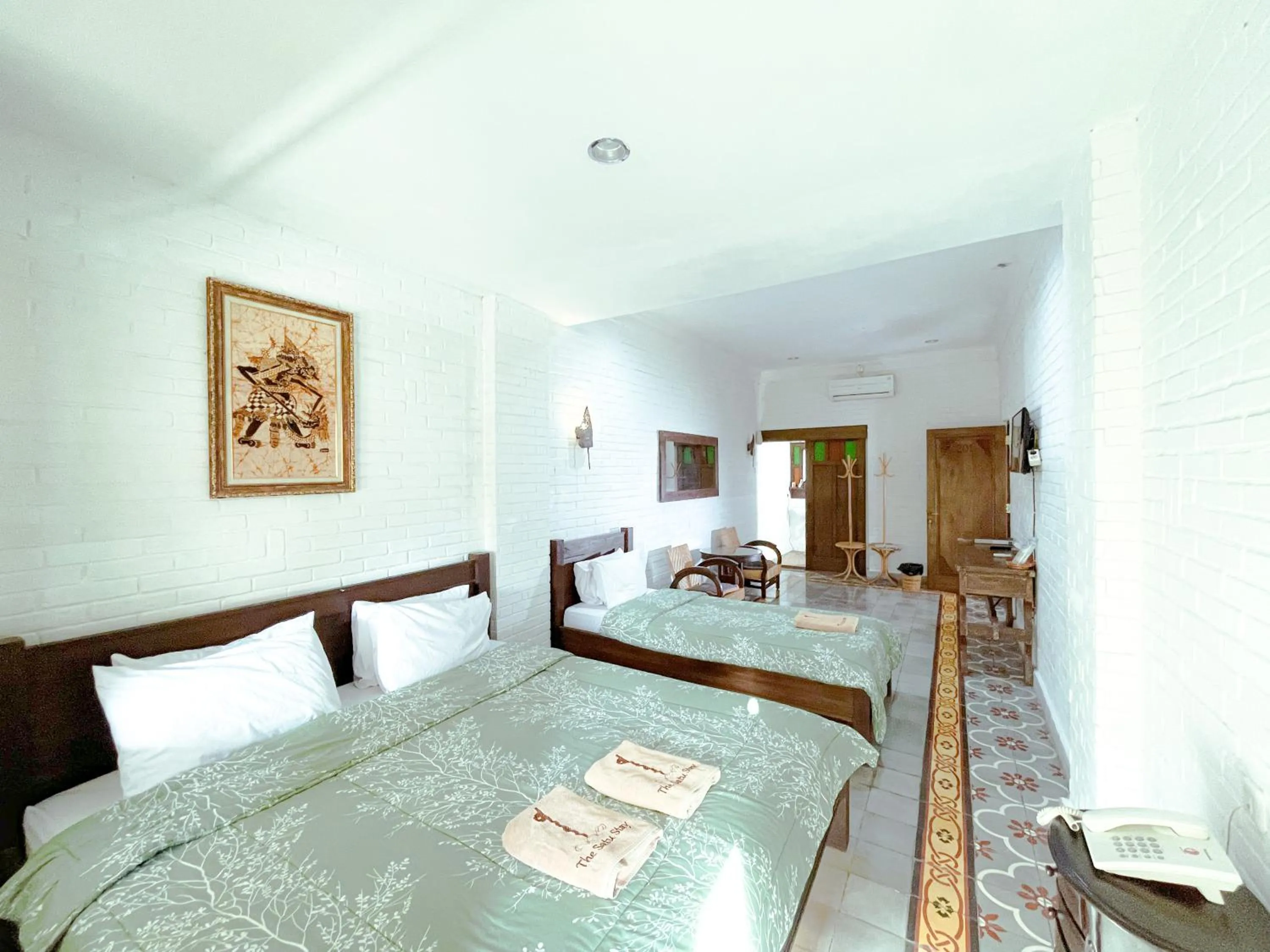 Bed in The Satu Stay Kayen