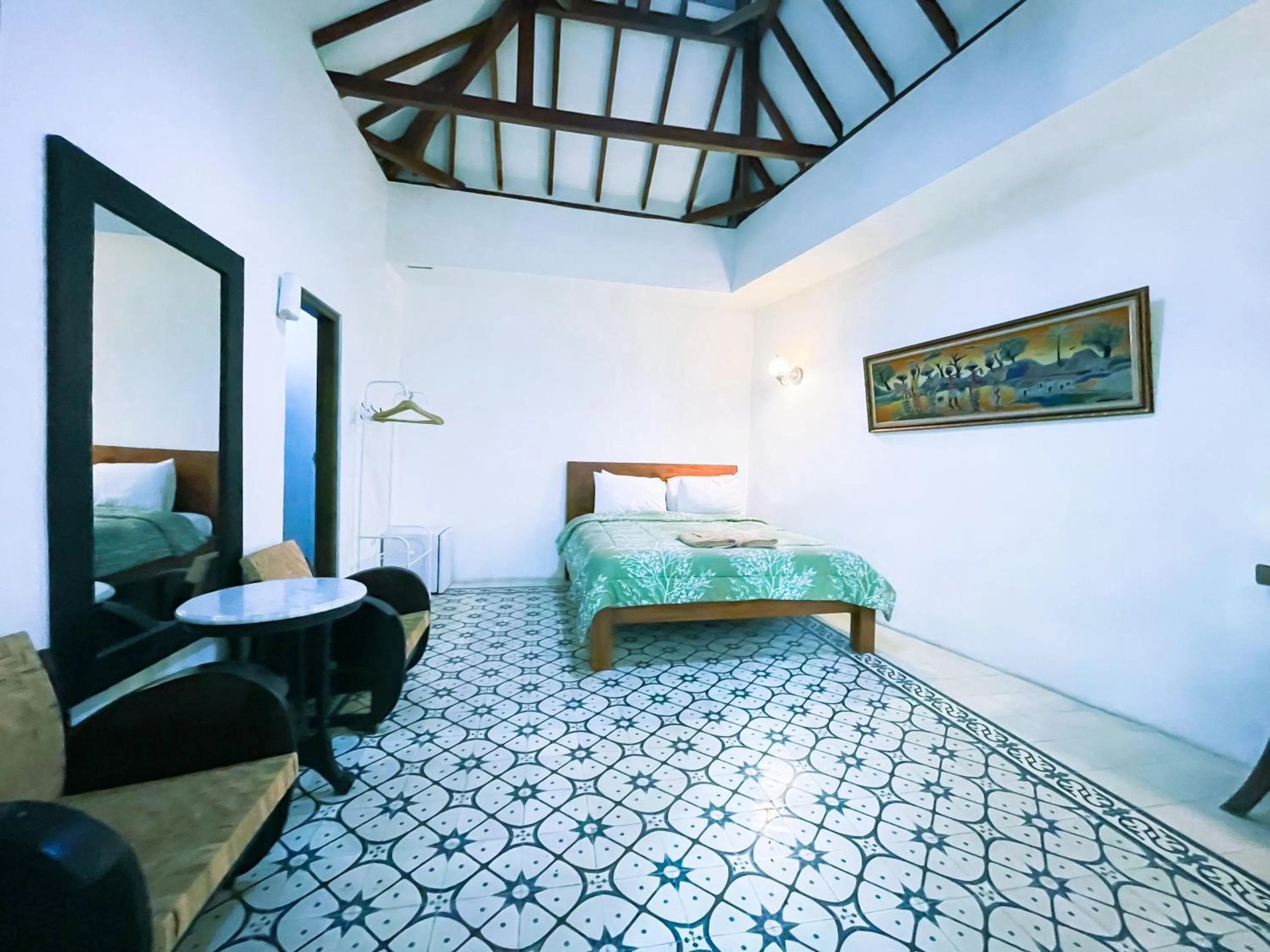 Bed in The Satu Stay Kayen