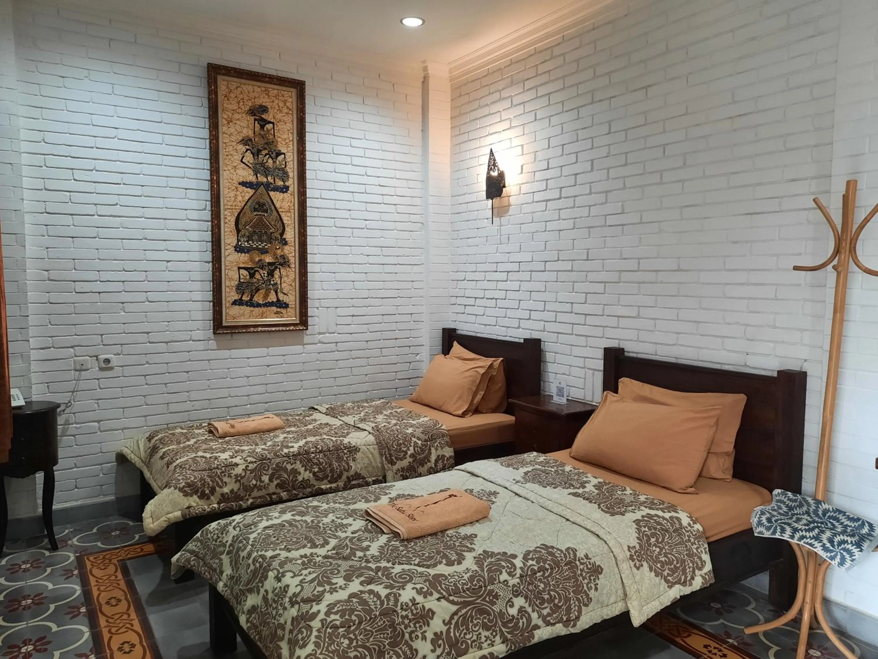 Bed in The Satu Stay Kayen