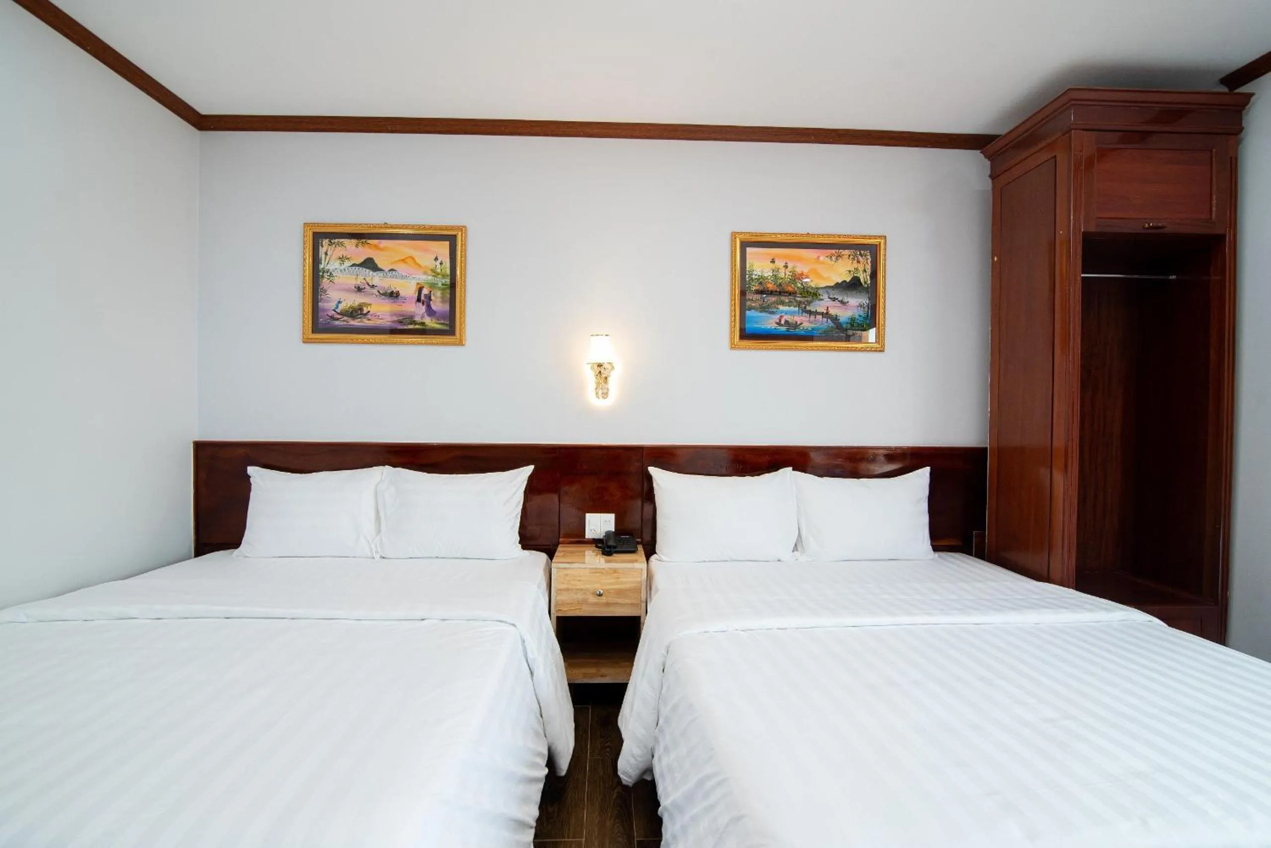 Bed in Minh Quang Hotel