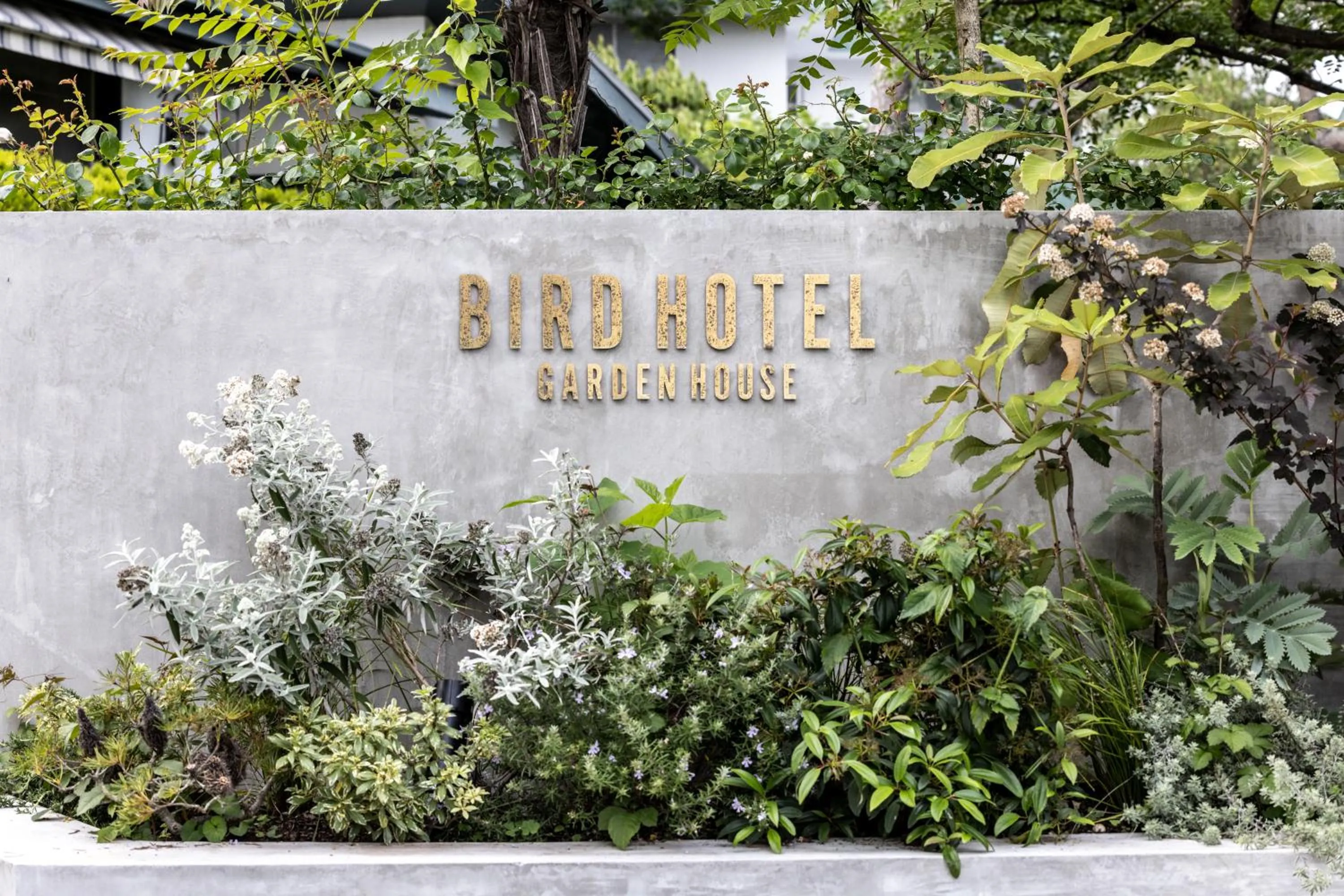 Property logo or sign in BIRD HOTEL