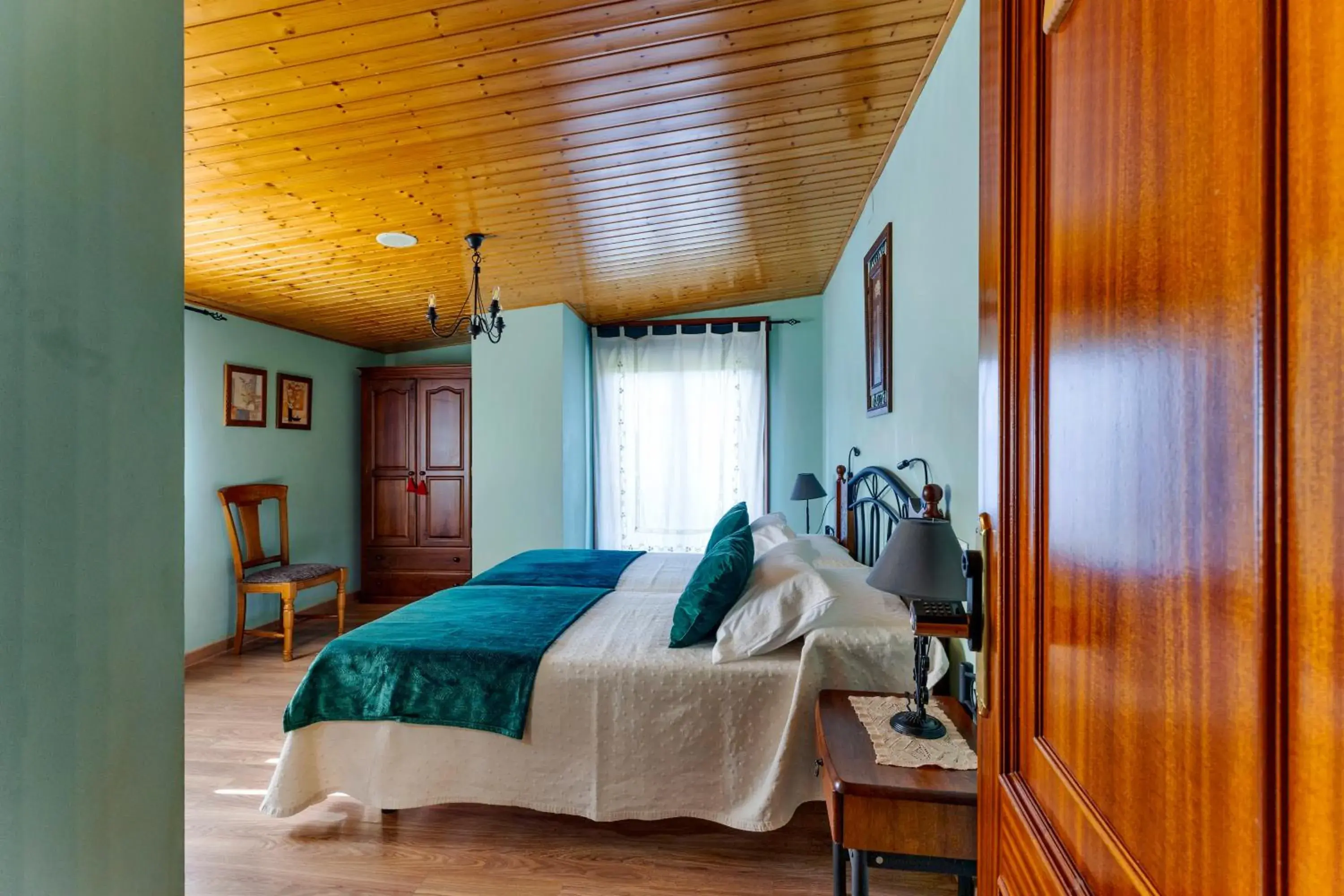 Double Room with Pool View in Casa Rural Os Carballos Double Room with Pool View in Casa Rural Os Carballos