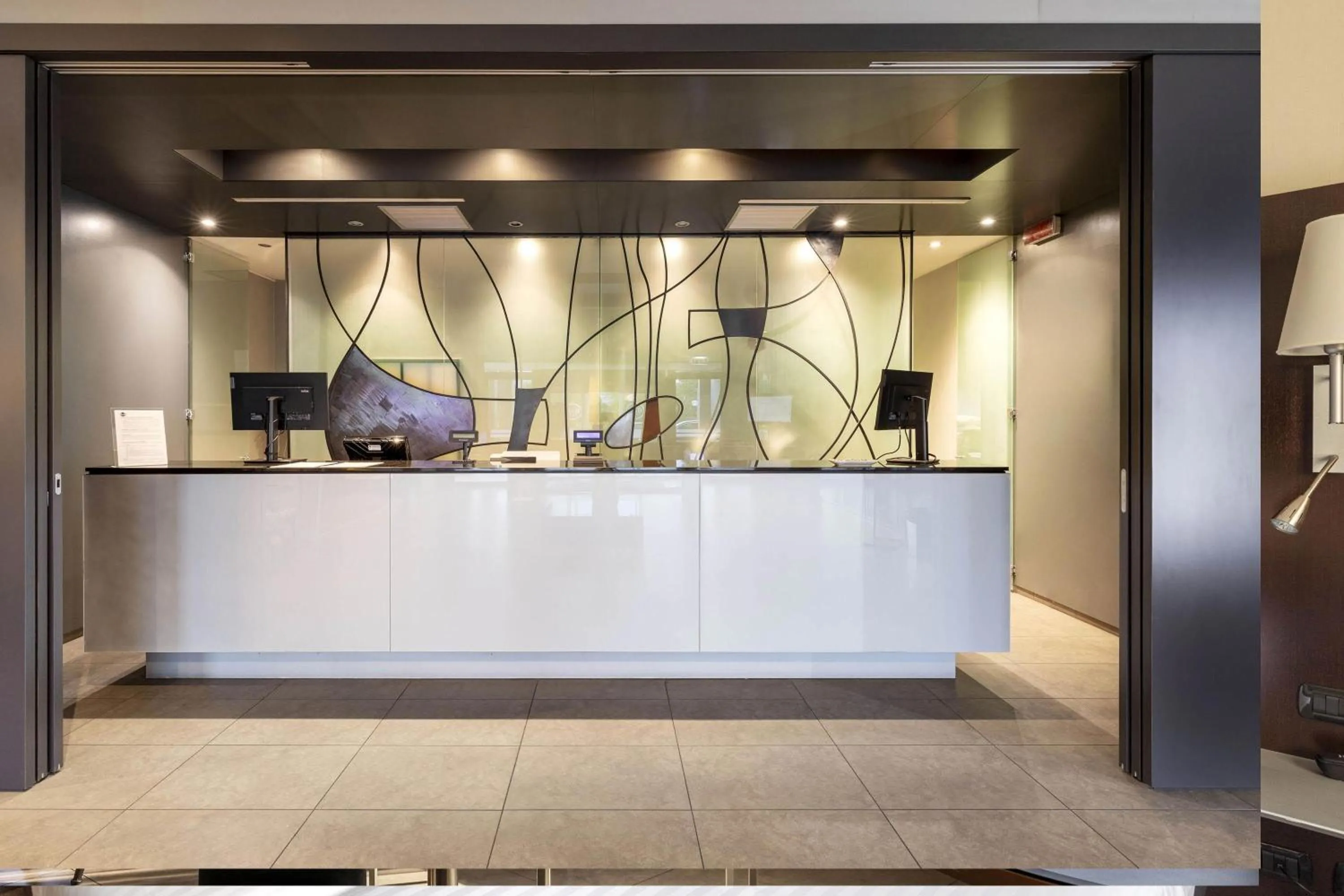 Lobby or reception in B&B Hotel Arezzo