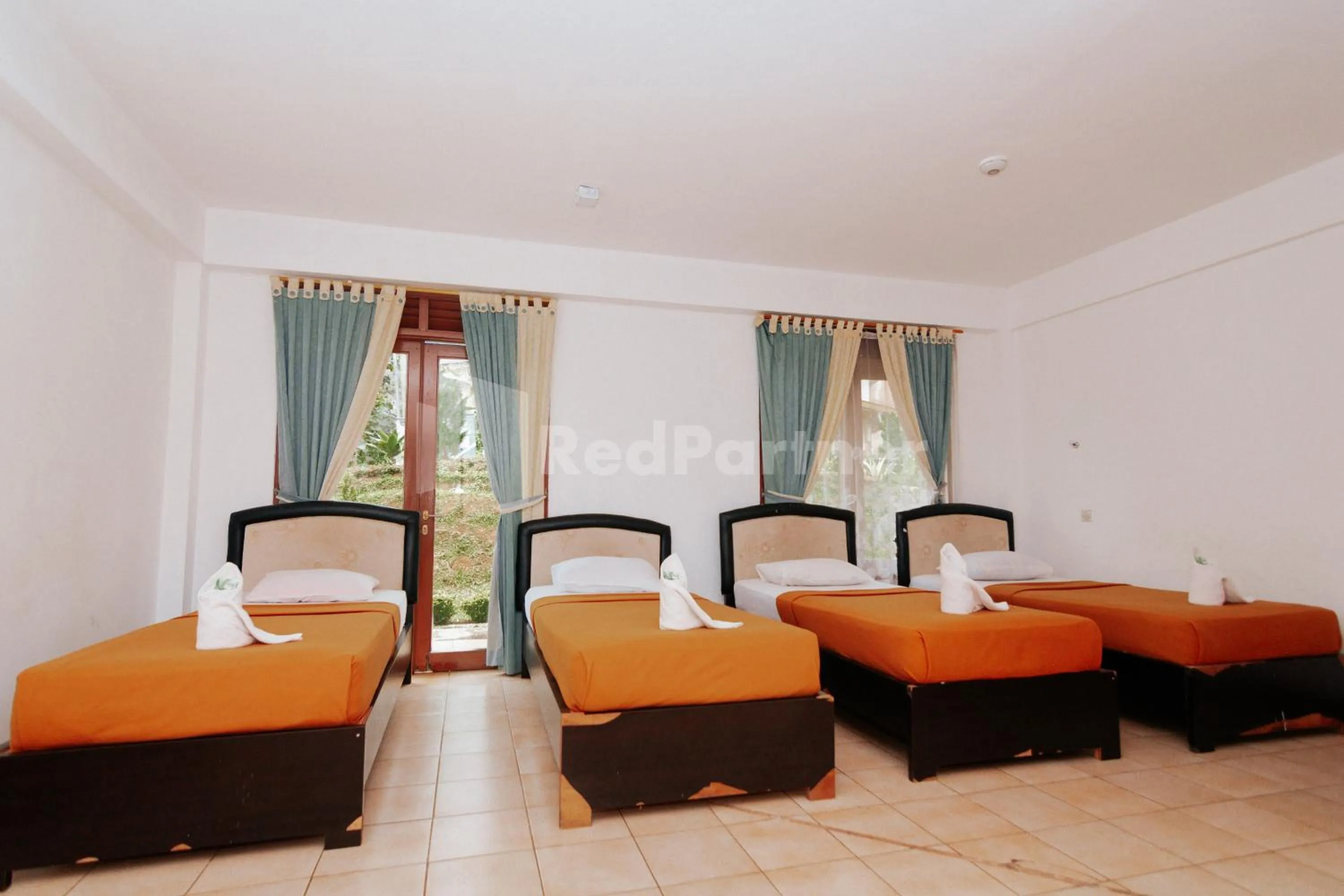 Photo of the whole room, Bed in Villa Green Valley Puncak RedPartner