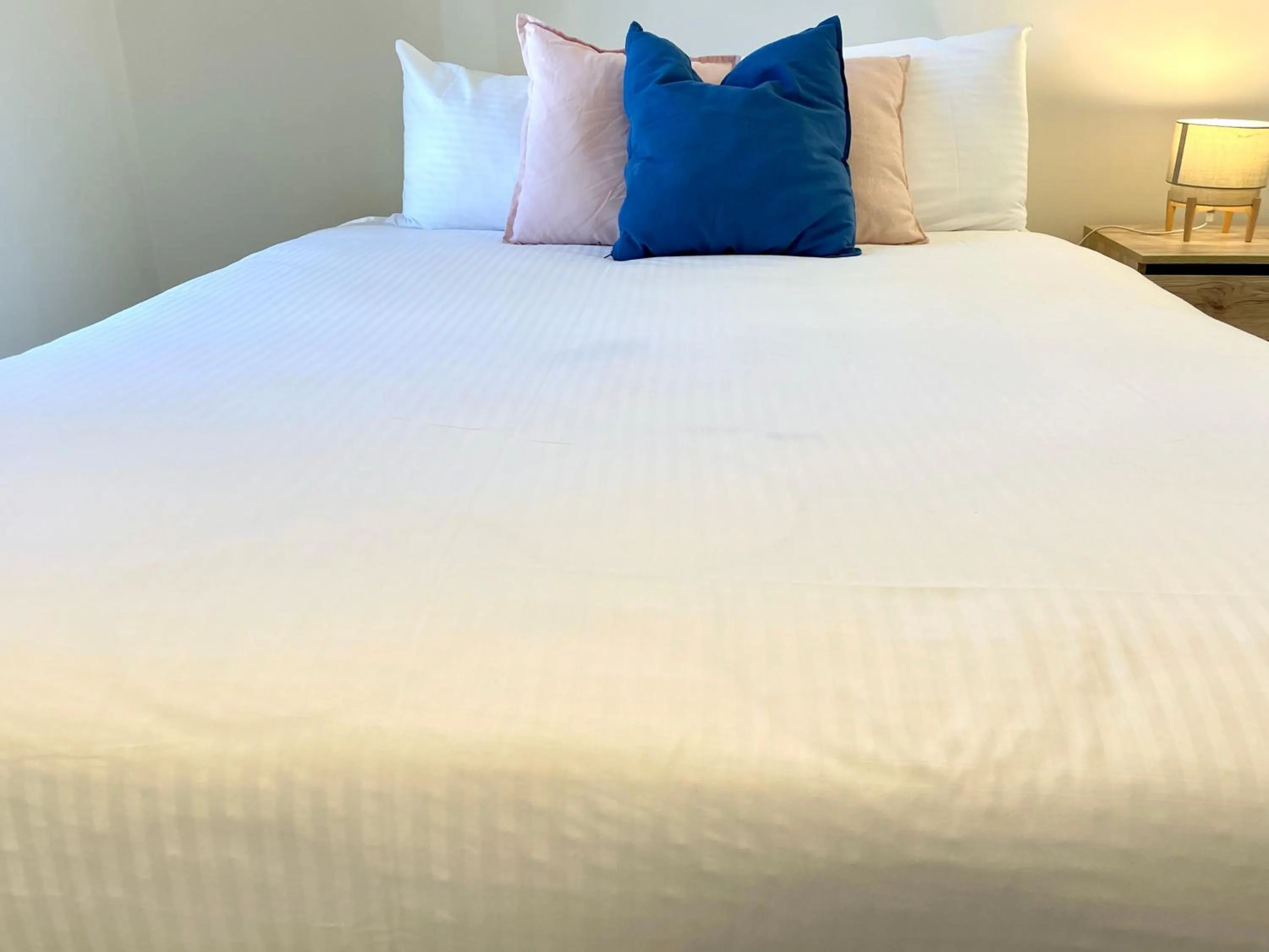 Bedroom, Bed in Readyset Apartments at Empire