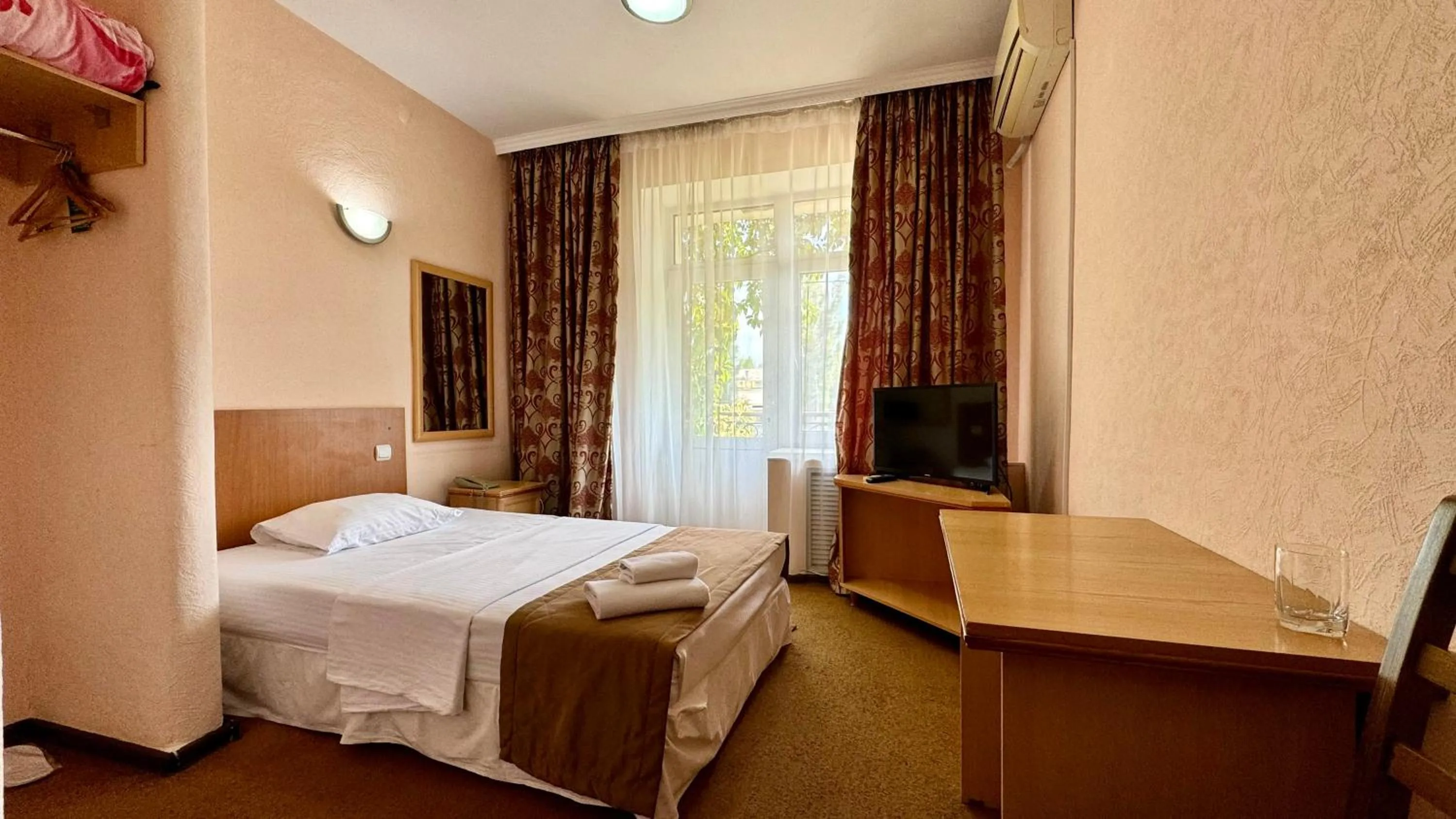 Bed in Hotel Zhambyl