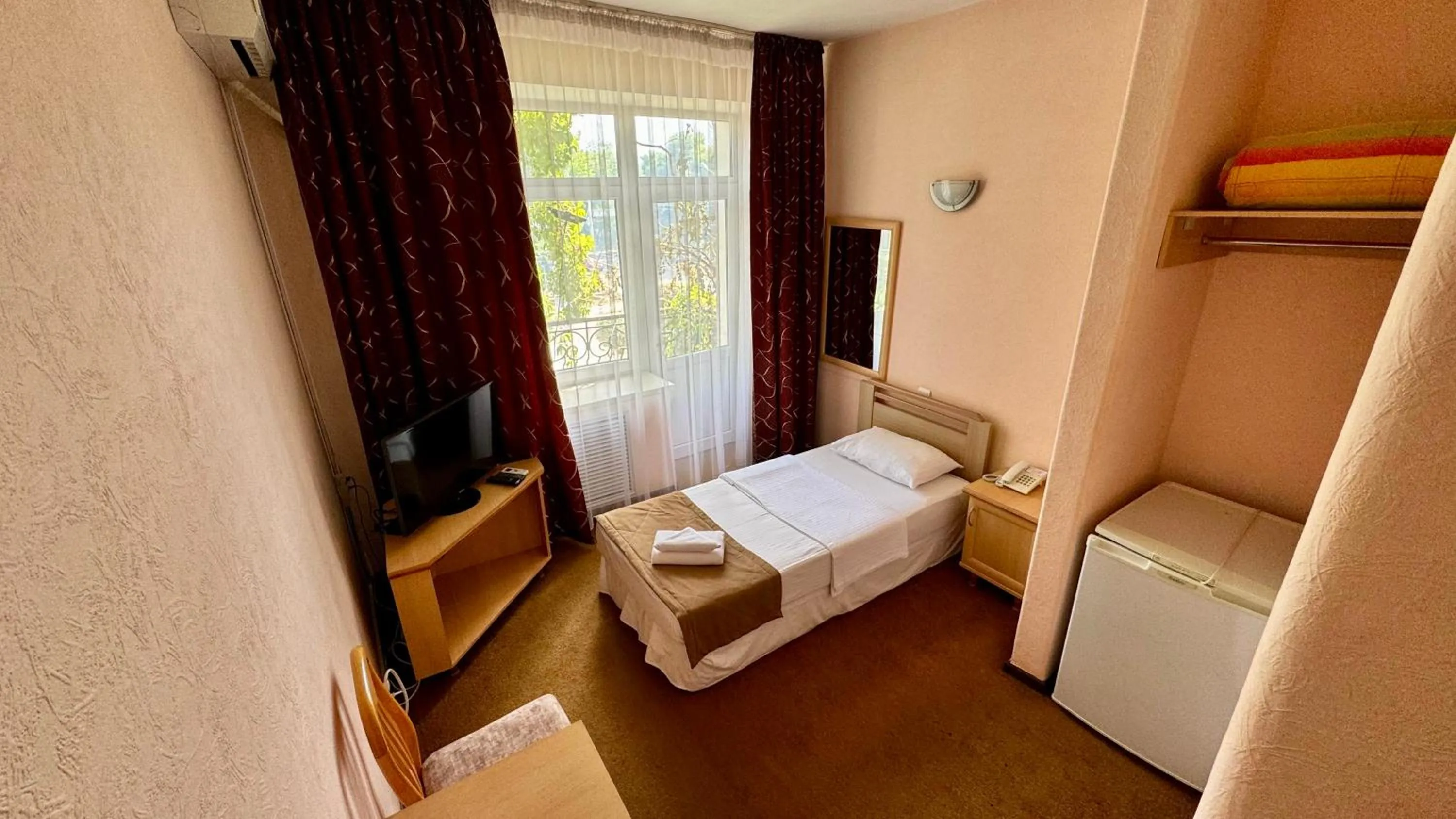 Bed in Hotel Zhambyl
