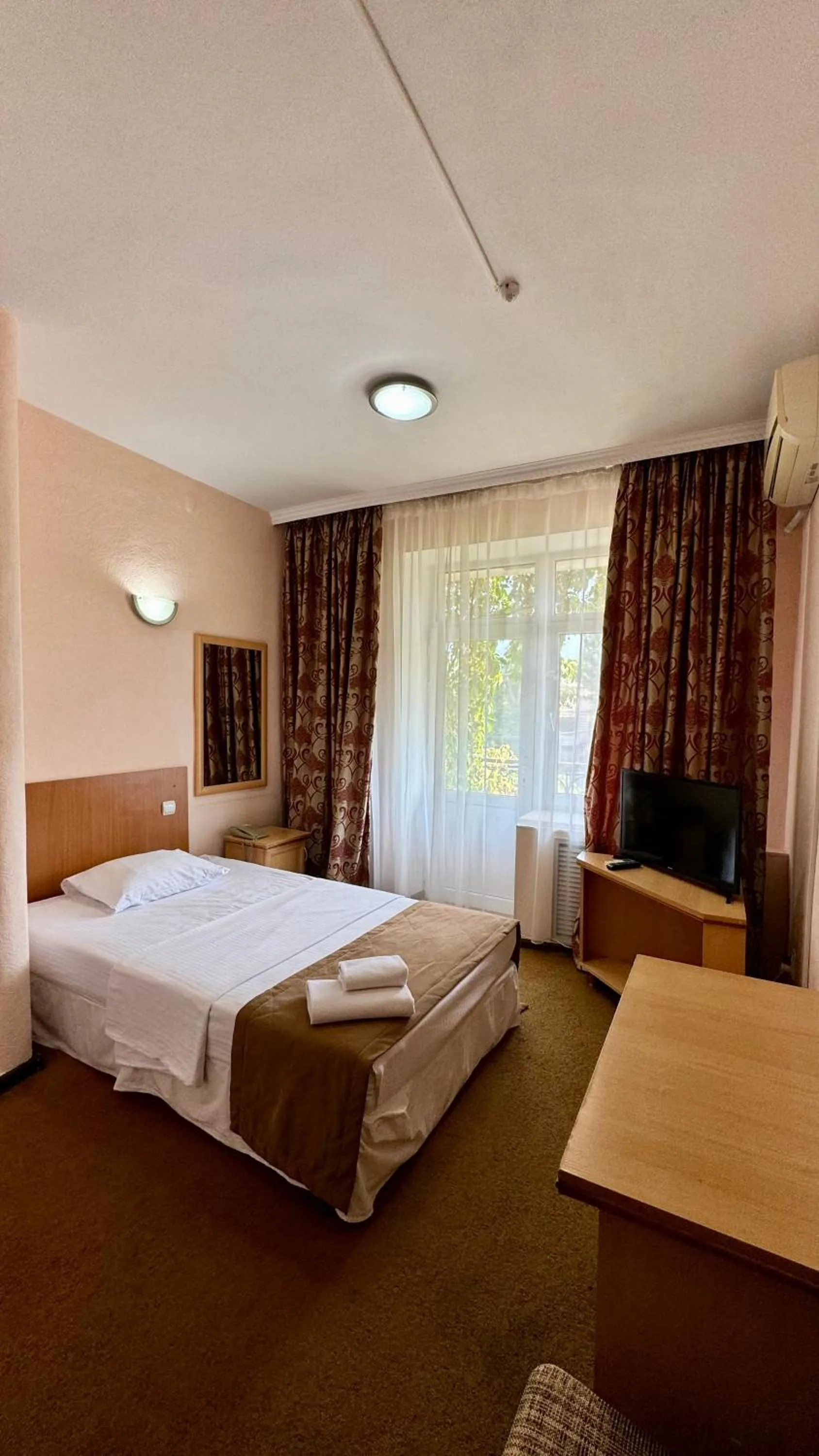 Bed in Hotel Zhambyl