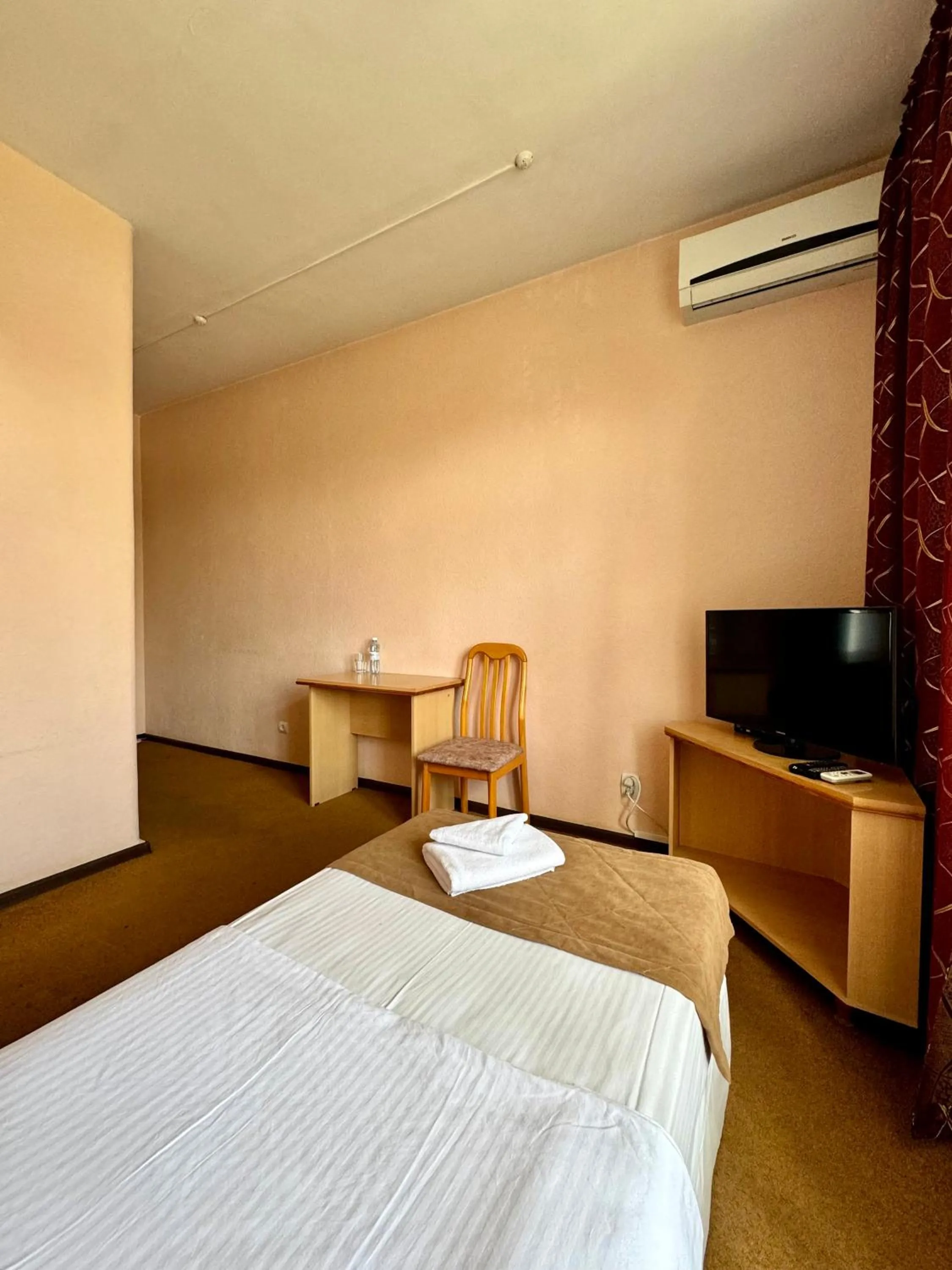 Bed in Hotel Zhambyl