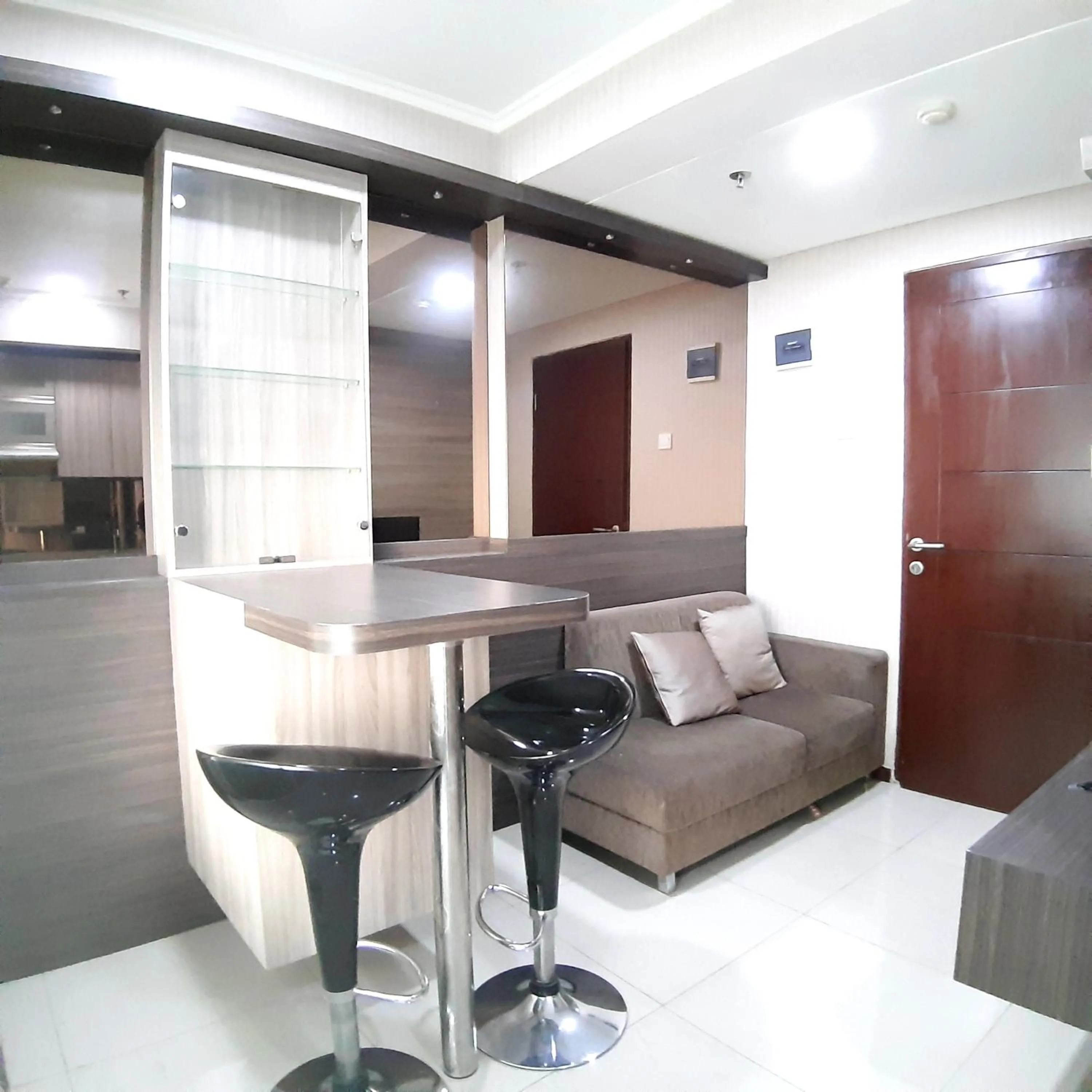 Living room in High Livin Apartment Pasteur