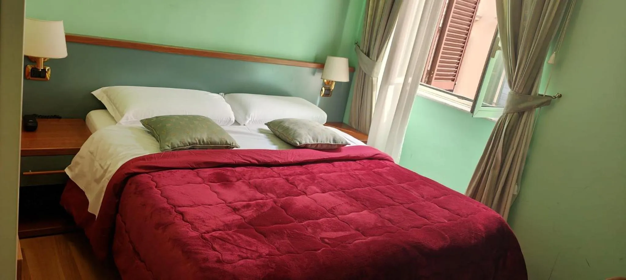 Bed in Hotel Fenicia