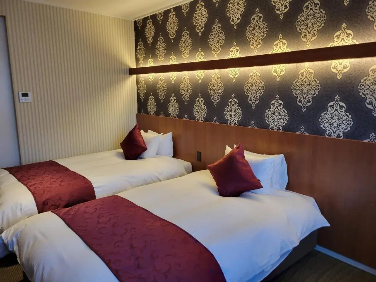 Bed in La Jolie Motomachi Bed in La Jolie Motomachi