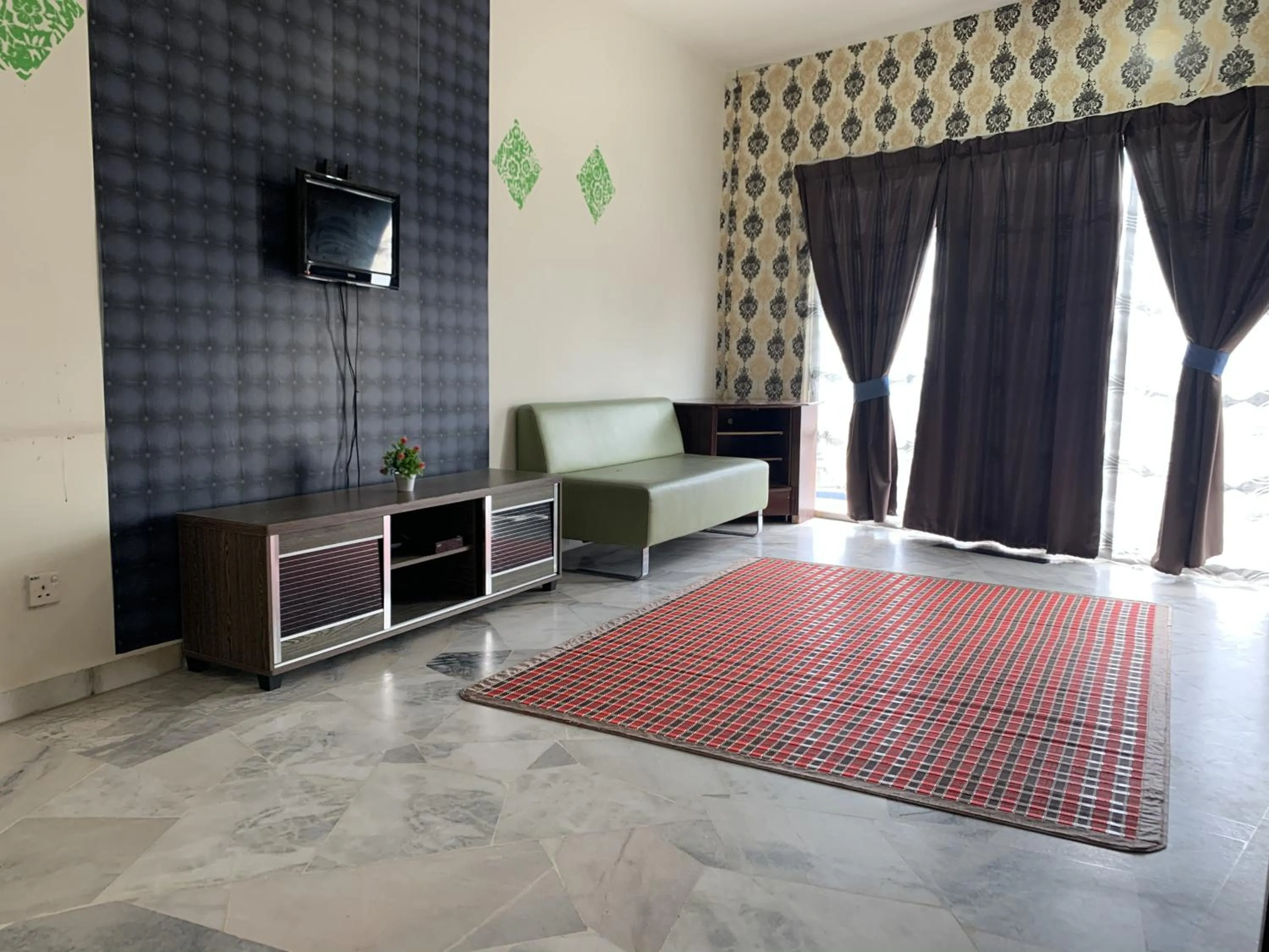 Living room, Bed in Apartment santai Marina