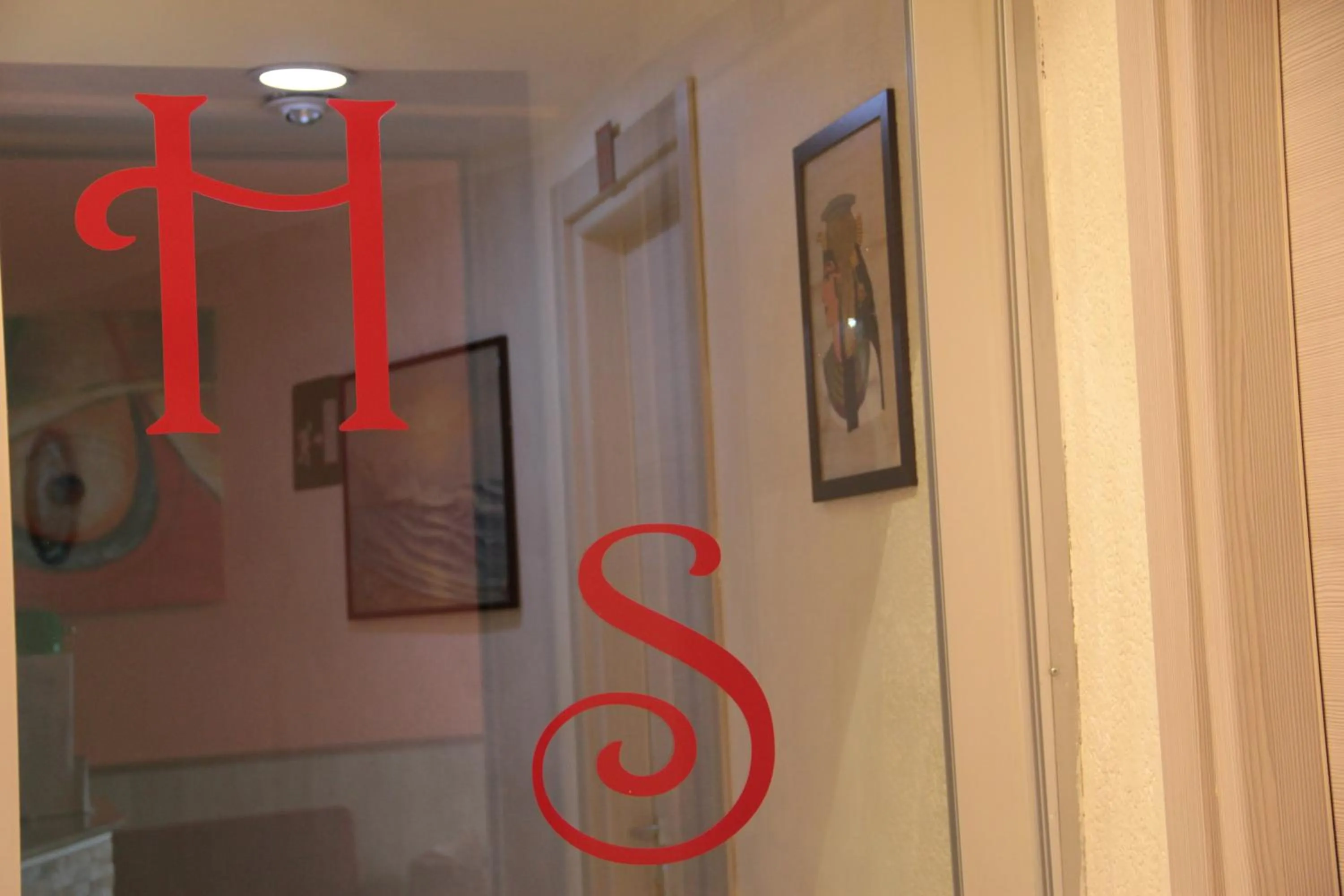 Property logo or sign in Hotel Siro